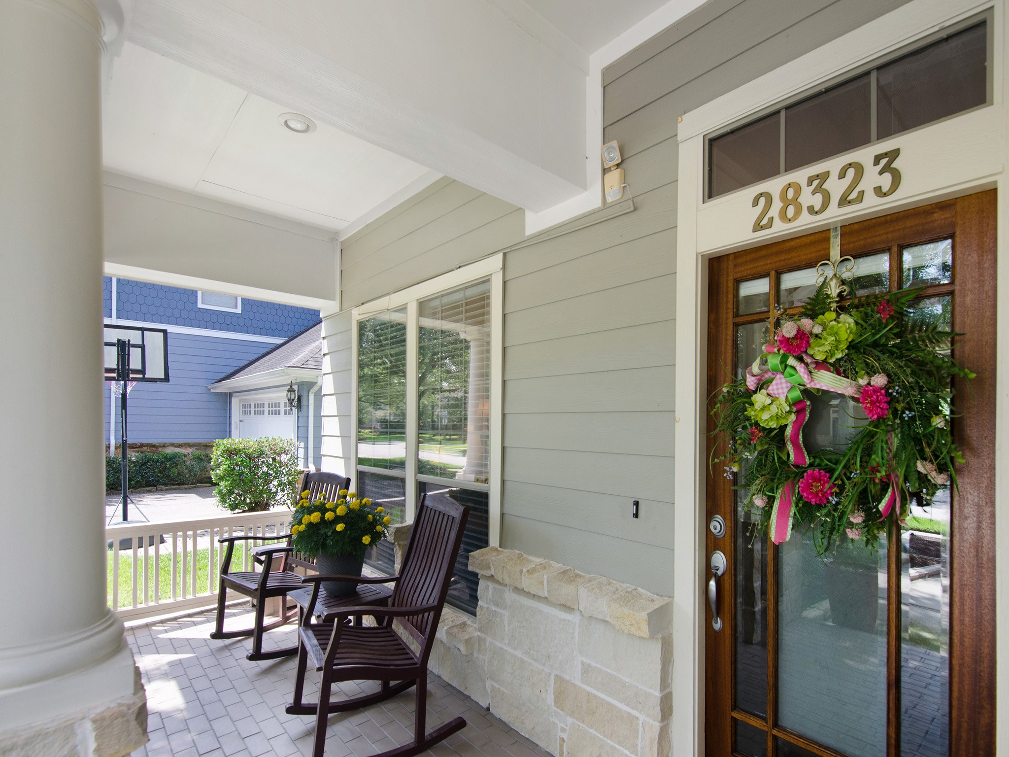 The inviting covered front porch creates a warm first impression and sets the tone for the comfort and charm found throughout the home.