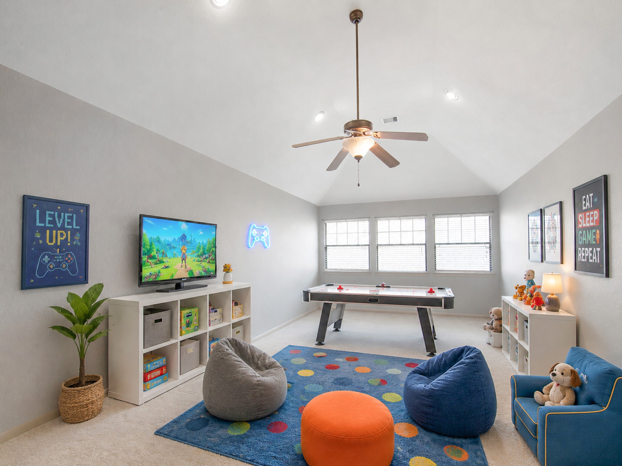 Virtually staged, large bonus/game room with vaulted ceiling, new carpet and oversized storage closet.