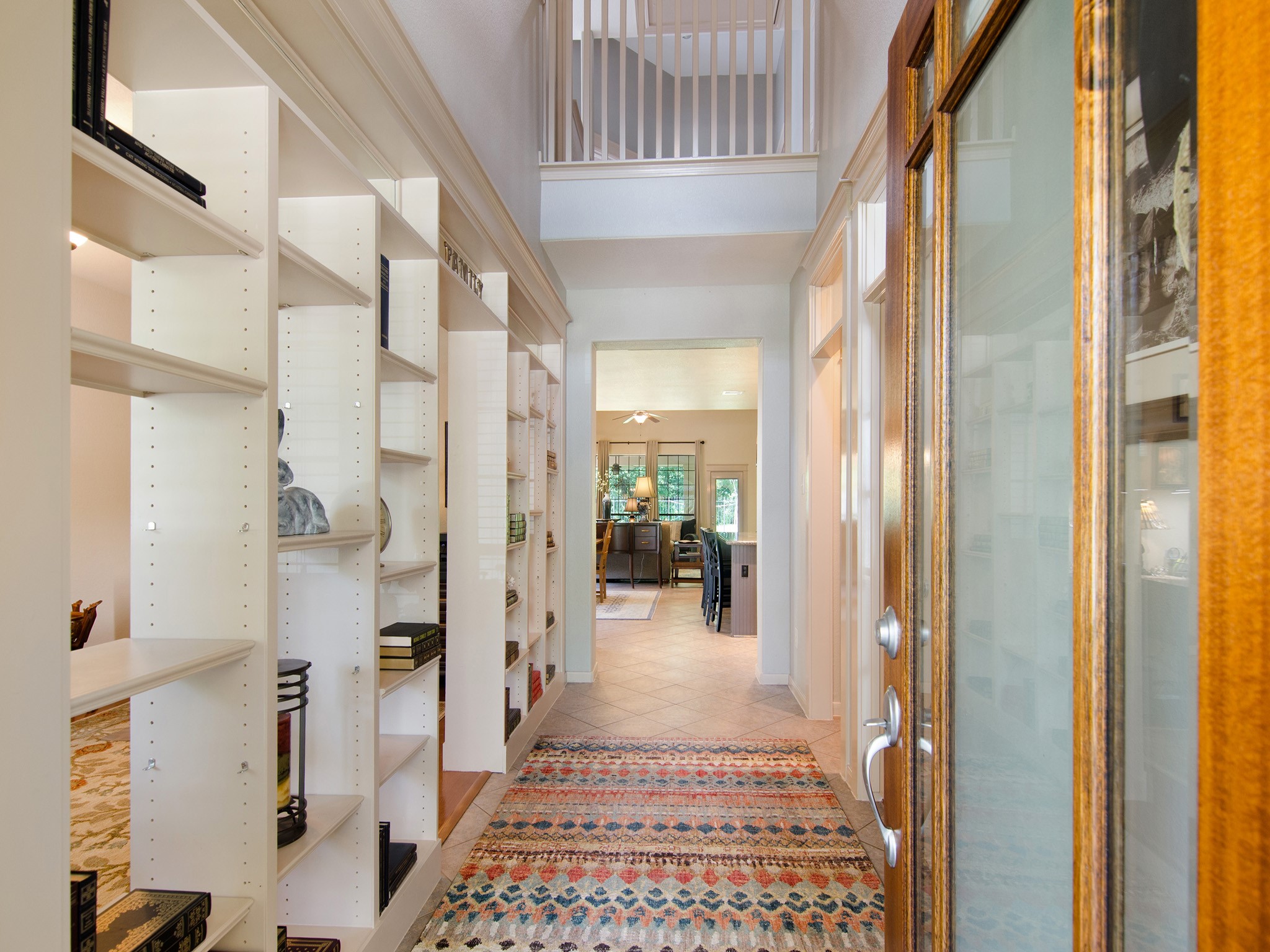 From the moment you open the door, the home's soaring ceilings and thoughtful layout create a sense of openness, elegance and connection between the living spaces.