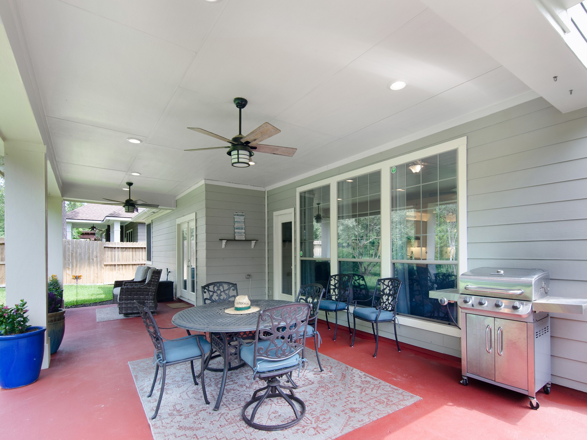 Fresh exterior paint (2022) and painted patio surface create a polished, well-maintained appearance.