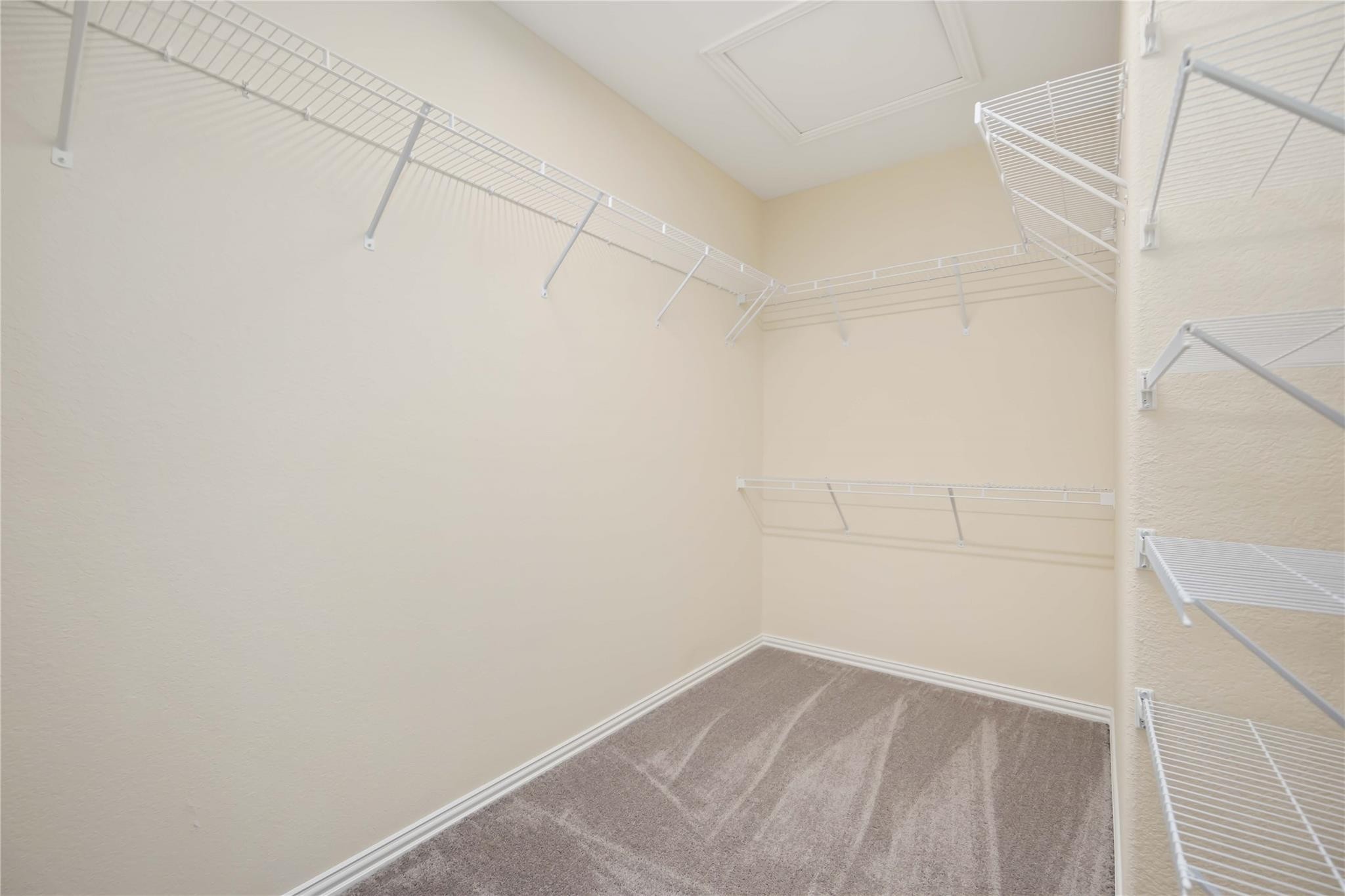 Large walk in closet in Primary