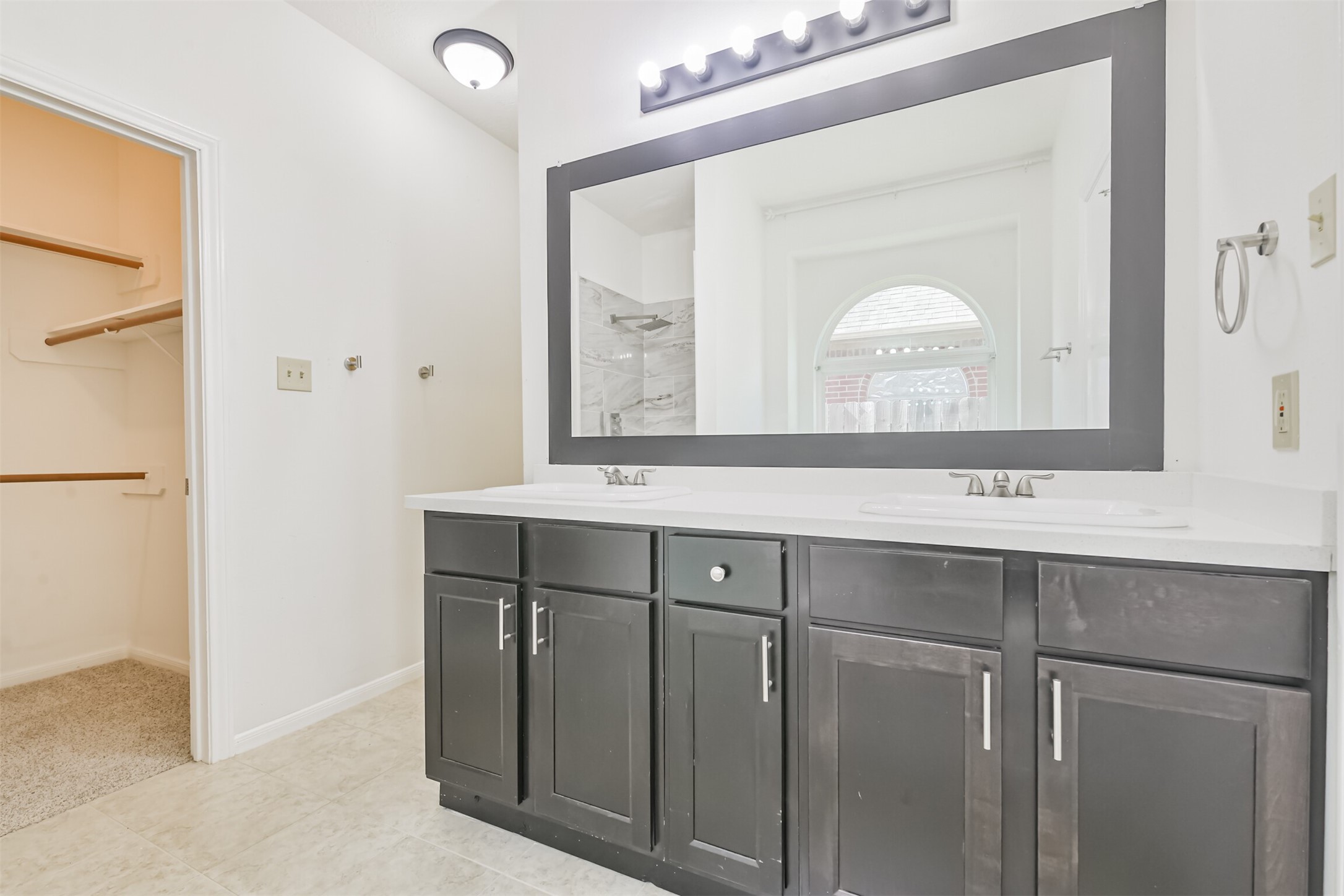 Primary Bathroom w/ Updated Cabinets and Mirror