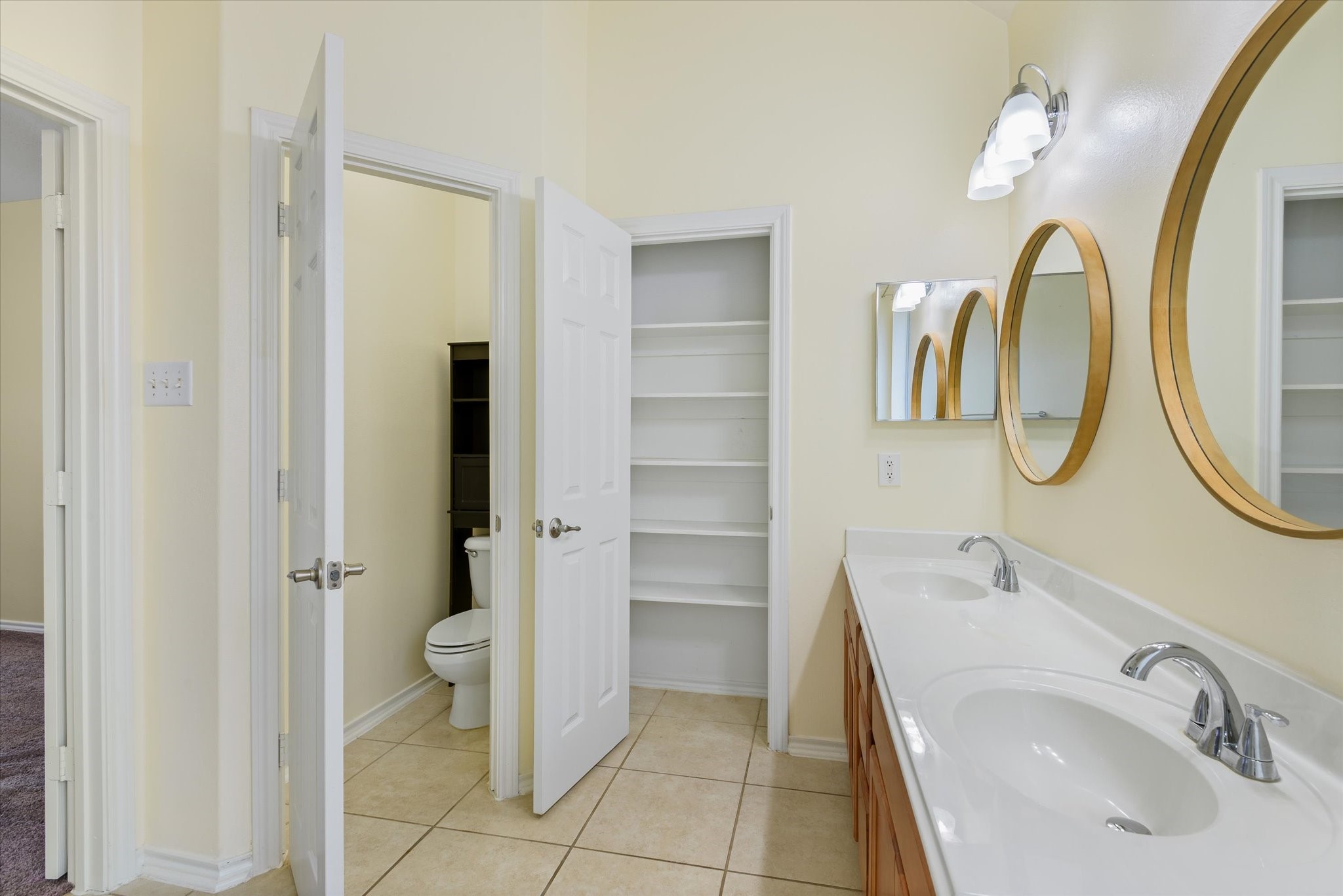Primary bedroom with walk in closet