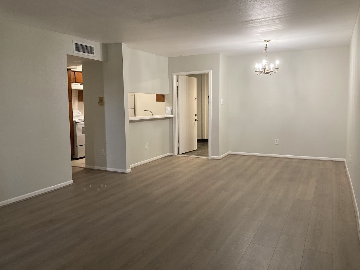 This condo unit is nicely remodeled with wood like floor