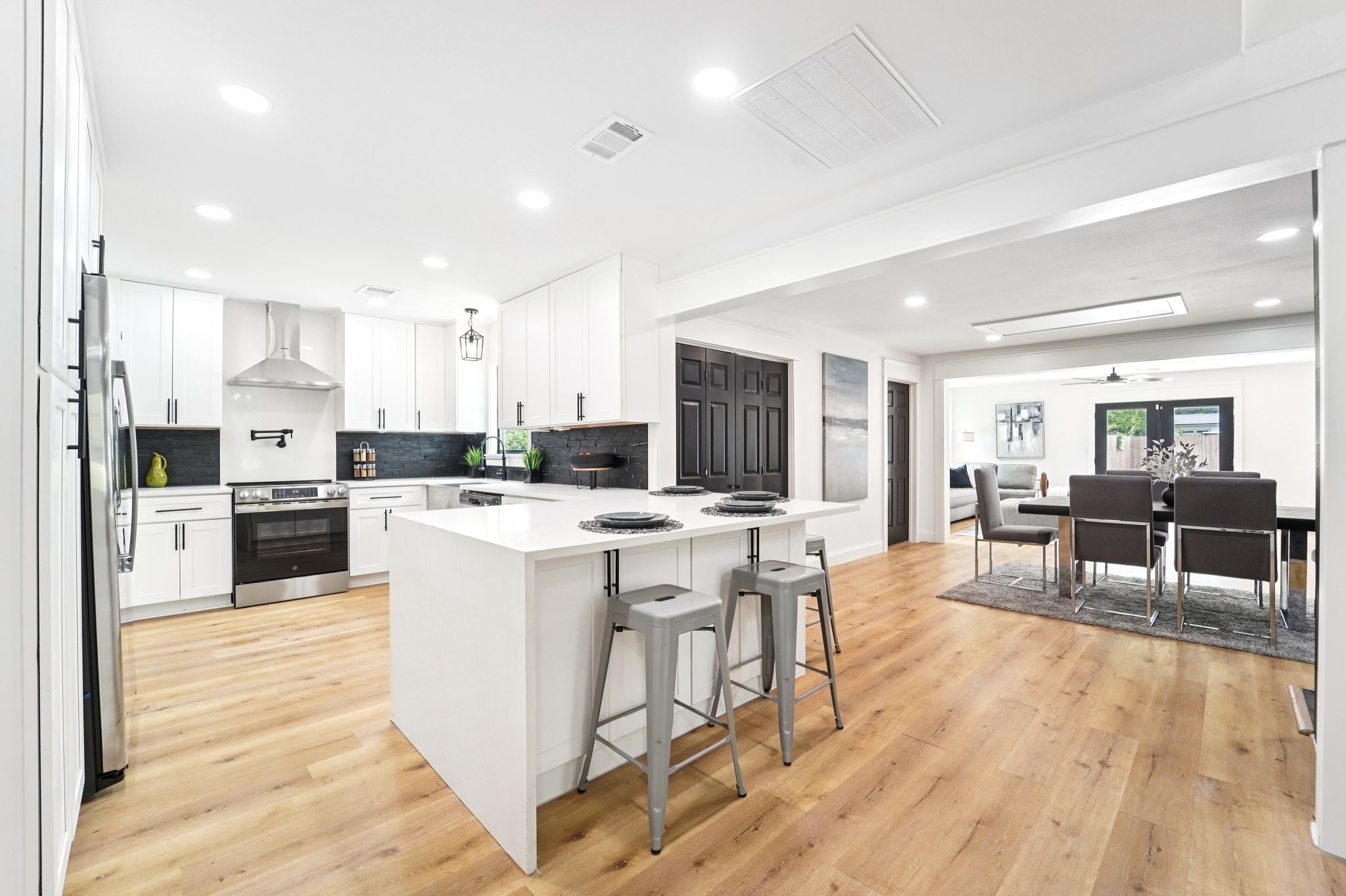 Designer Kitchen w/ Island Seating / Living 2