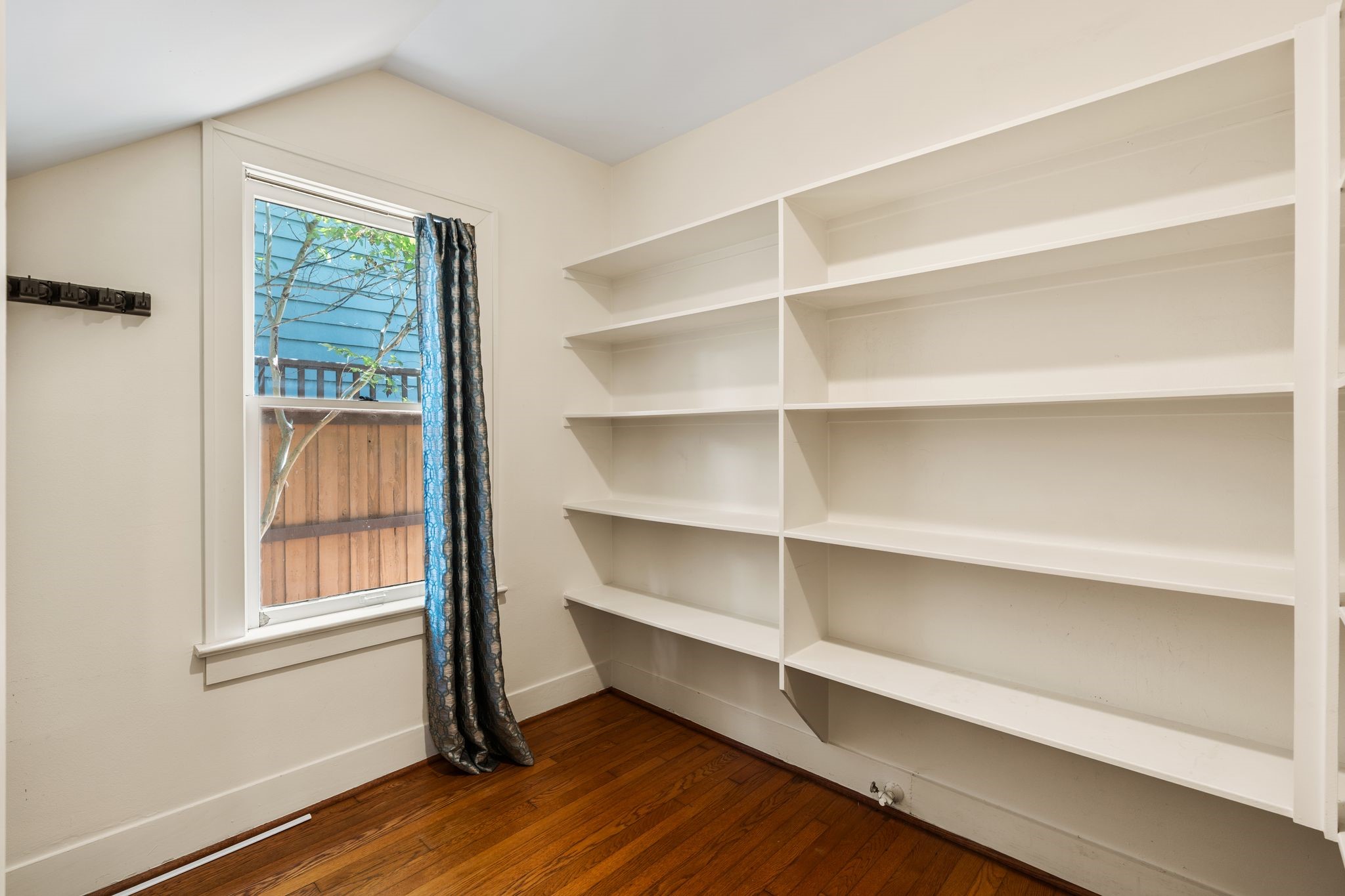 The kitchen also features a large walk-in pantry. The kitchen also features a large walk-in pantry.
