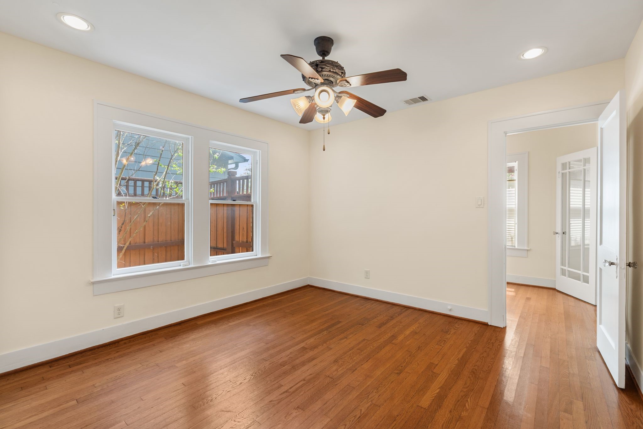 Bedroom # 2 on the first floor features wood floors and recessed lighting. Bedroom # 2 on the first floor features wood floors and recessed lighting.