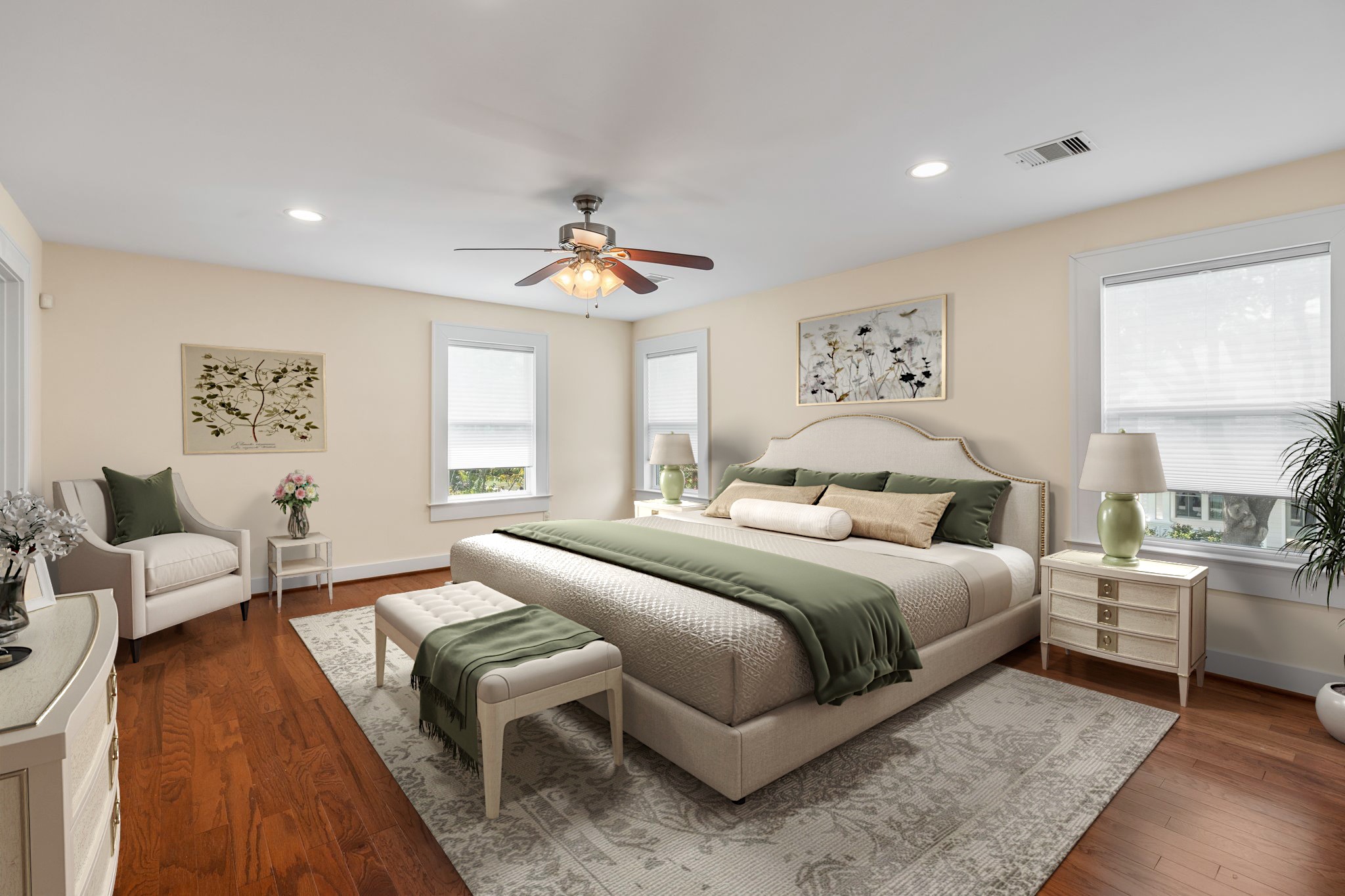 Spacious primary bedroom features a walk-in closet, wood floors and recessed lighting.  Virtually staged