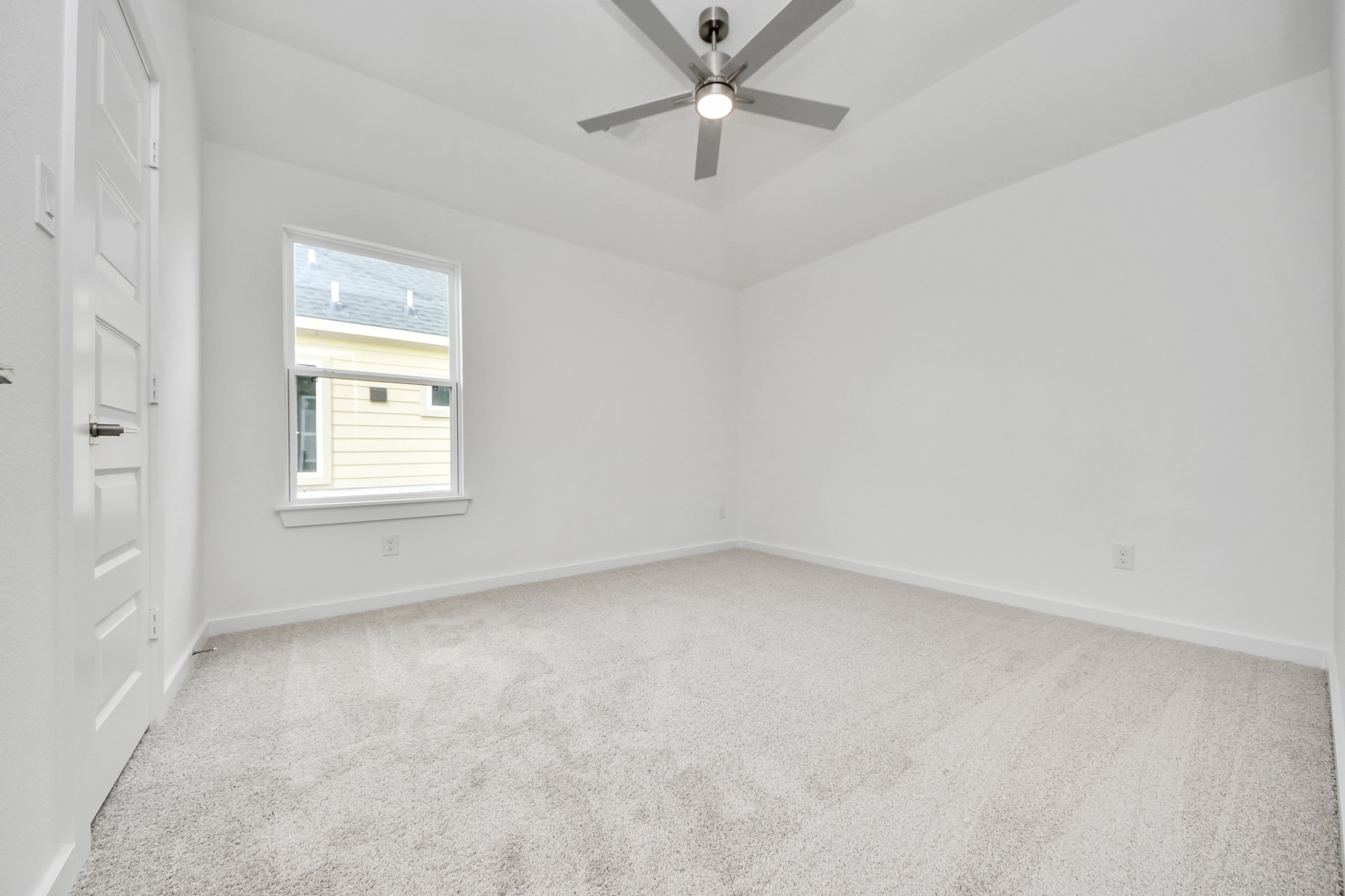Generously sized secondary bedrooms featuring spacious closets, soft and inviting carpeting underfoot, large windows allowing plenty of natural light, and the added touch of privacy blinds for your personal retreat. Sample photo of completed home with similar floor plan. Actual colors and selections may vary.