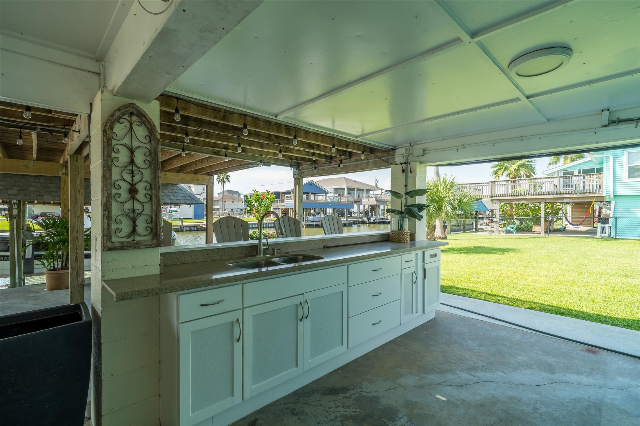 Downstairs features a built-in bar with a sink, creating the perfect spot to gather and share stories about the big one that got away after a day of fishing on the water.