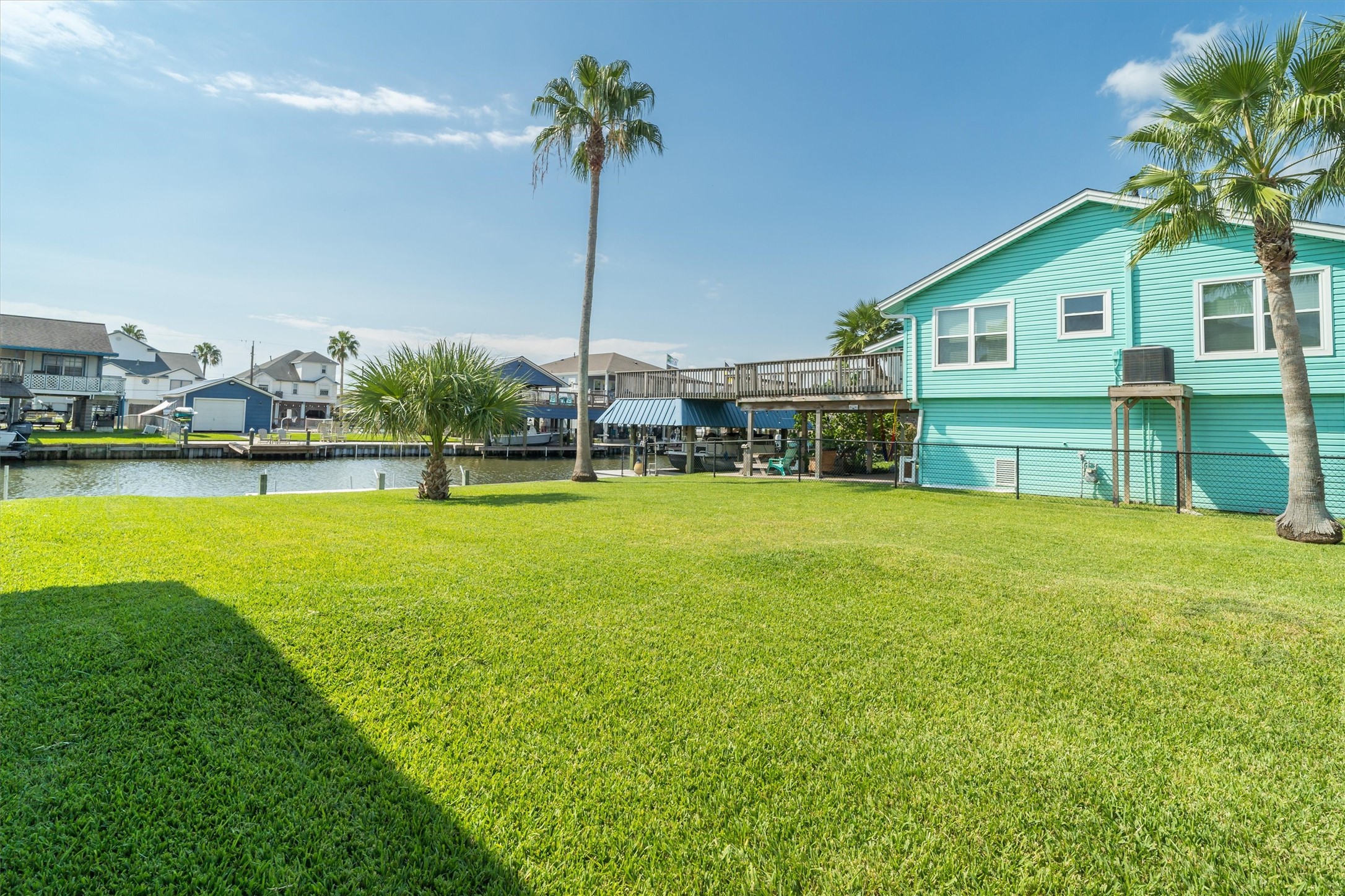 View of the empty lot that is part of the property. Buyers can choose what they do on the property or just leave it alone for the extra space. Three lots in Bayou Vista are rare