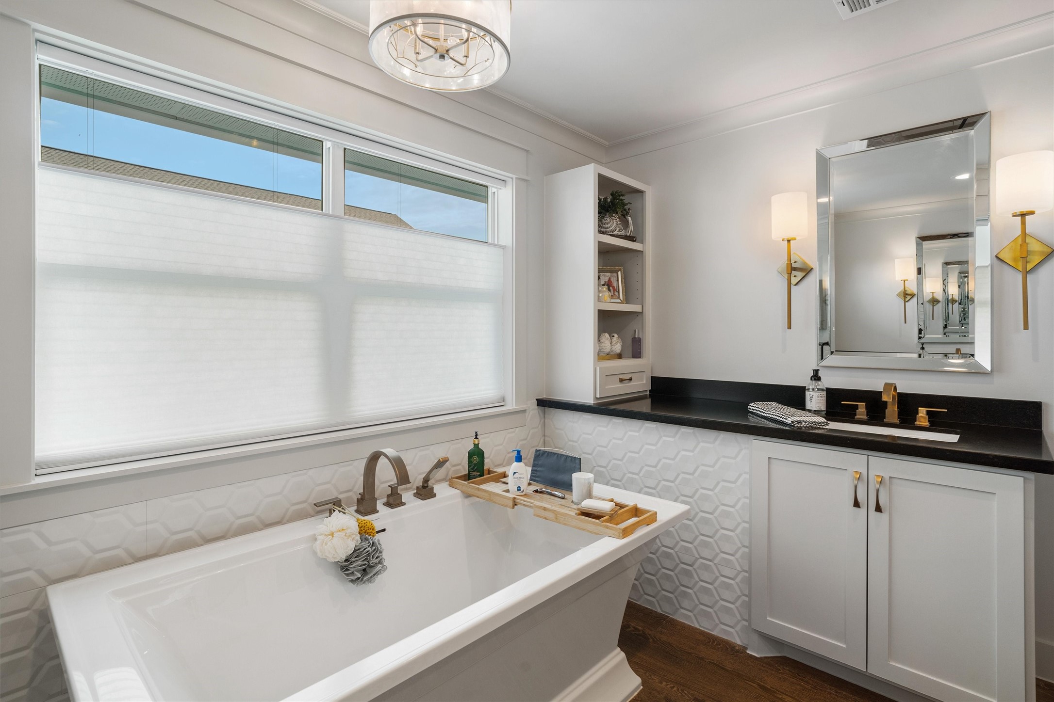Luxurious soaking tub set beneath a bright, inviting space  the perfect retreat for relaxation and spa-like comfort at home