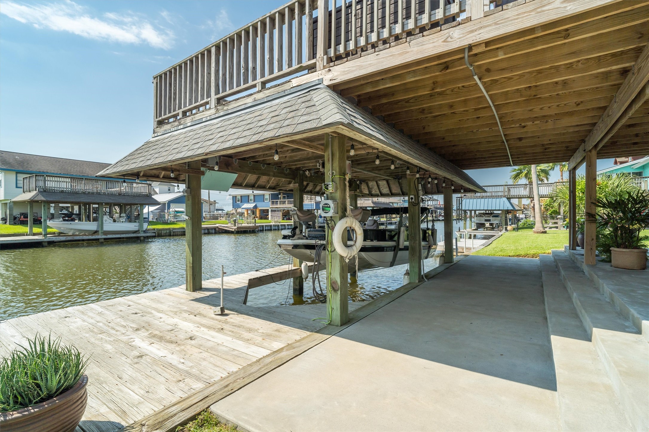 Enjoy the convenience of your very own boathouse and boat slipglide in after a day on the water and park with ease. Setting out for fishing, cruising, or adventure is simple and effortless, right from your own yard