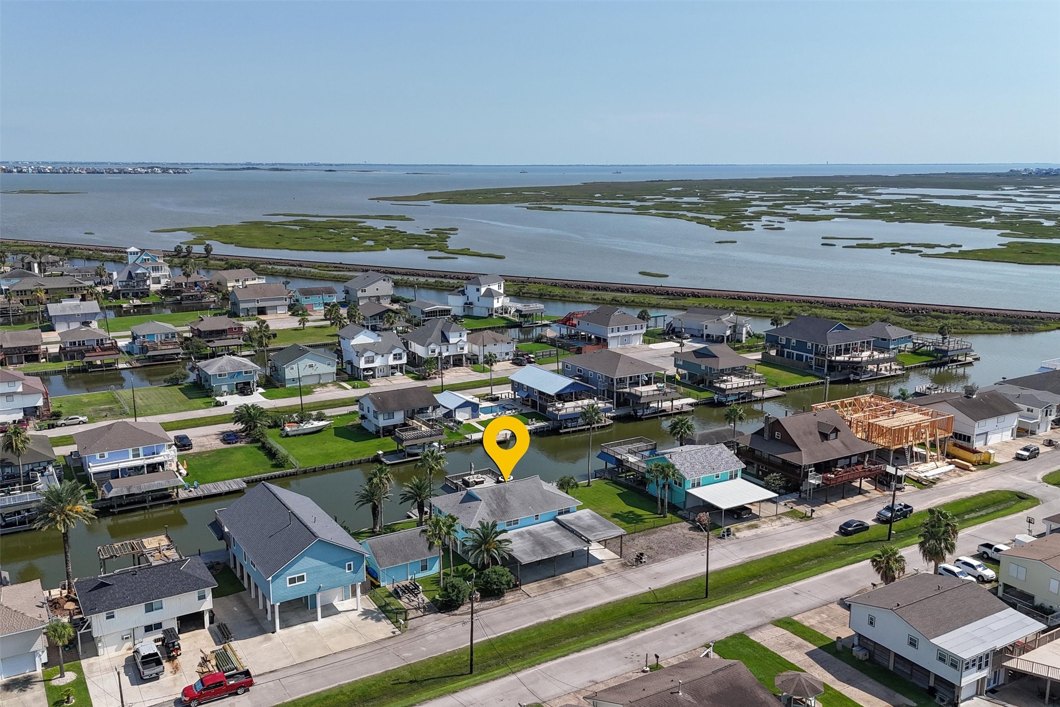 This photo shows you how close the home is to the boating exit. Beyond the boating exit is Jones Lake, the ICW, Galveston Bay and the Diversionary Canal This photo shows you how close the home is to the boating exit. Beyond the boating exit is Jones Lake, the ICW, Galveston Bay and the Diversionary Canal