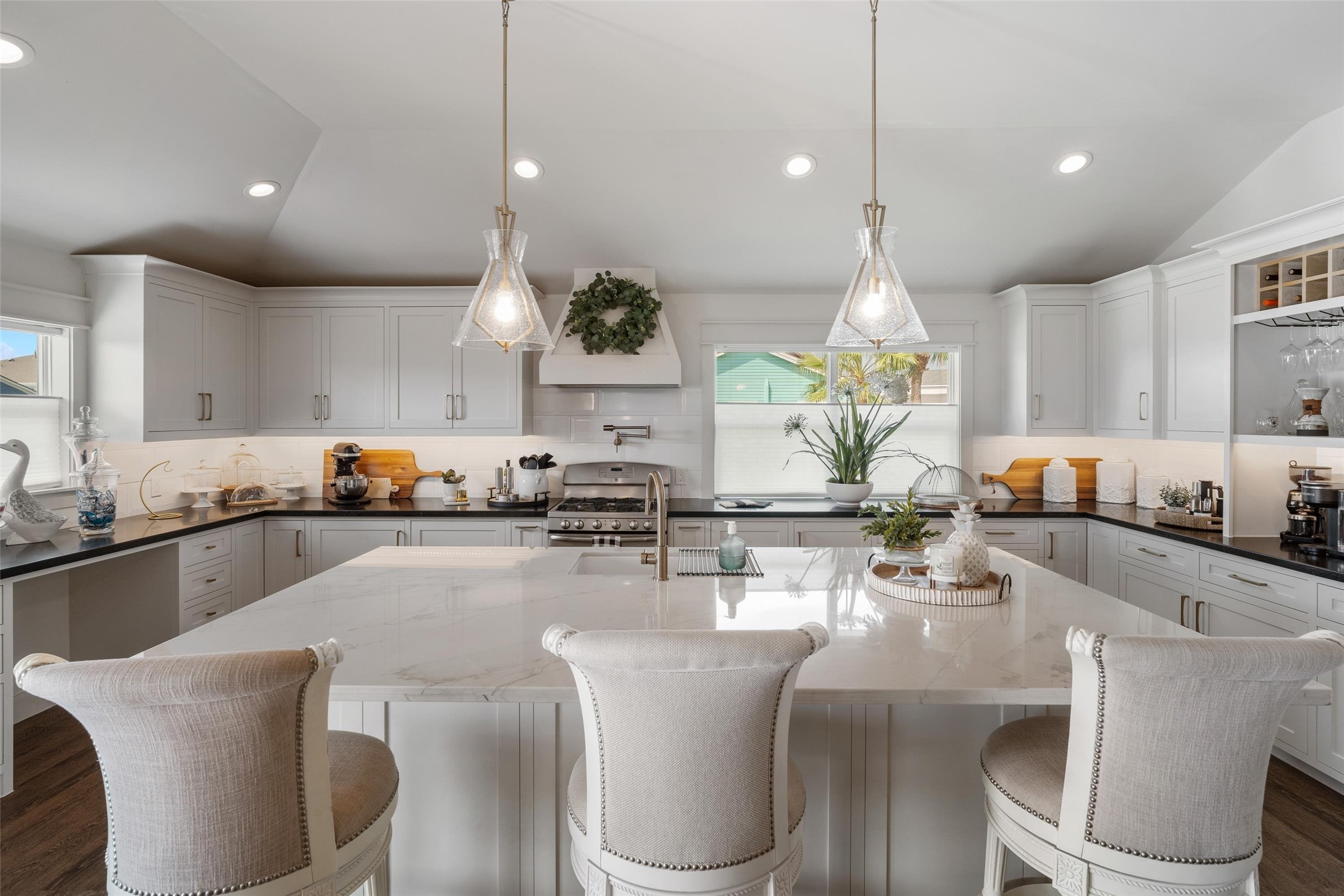This kitchen is the hub of the home. The shear size itself outdoes most kitchens in the community, but the high end touches is "chef's kiss" This kitchen is the hub of the home. The shear size itself outdoes most kitchens in the community, but the high end touches is "chef's kiss"