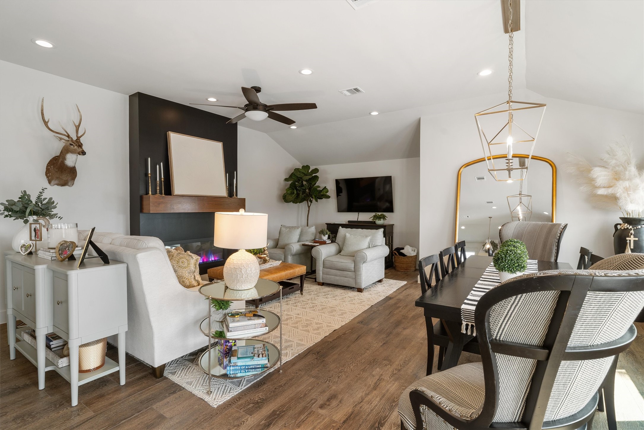 The very large living area, with a custom show stopping electric fireplace, is the perfect setting for evening relaxation after a long day on the water