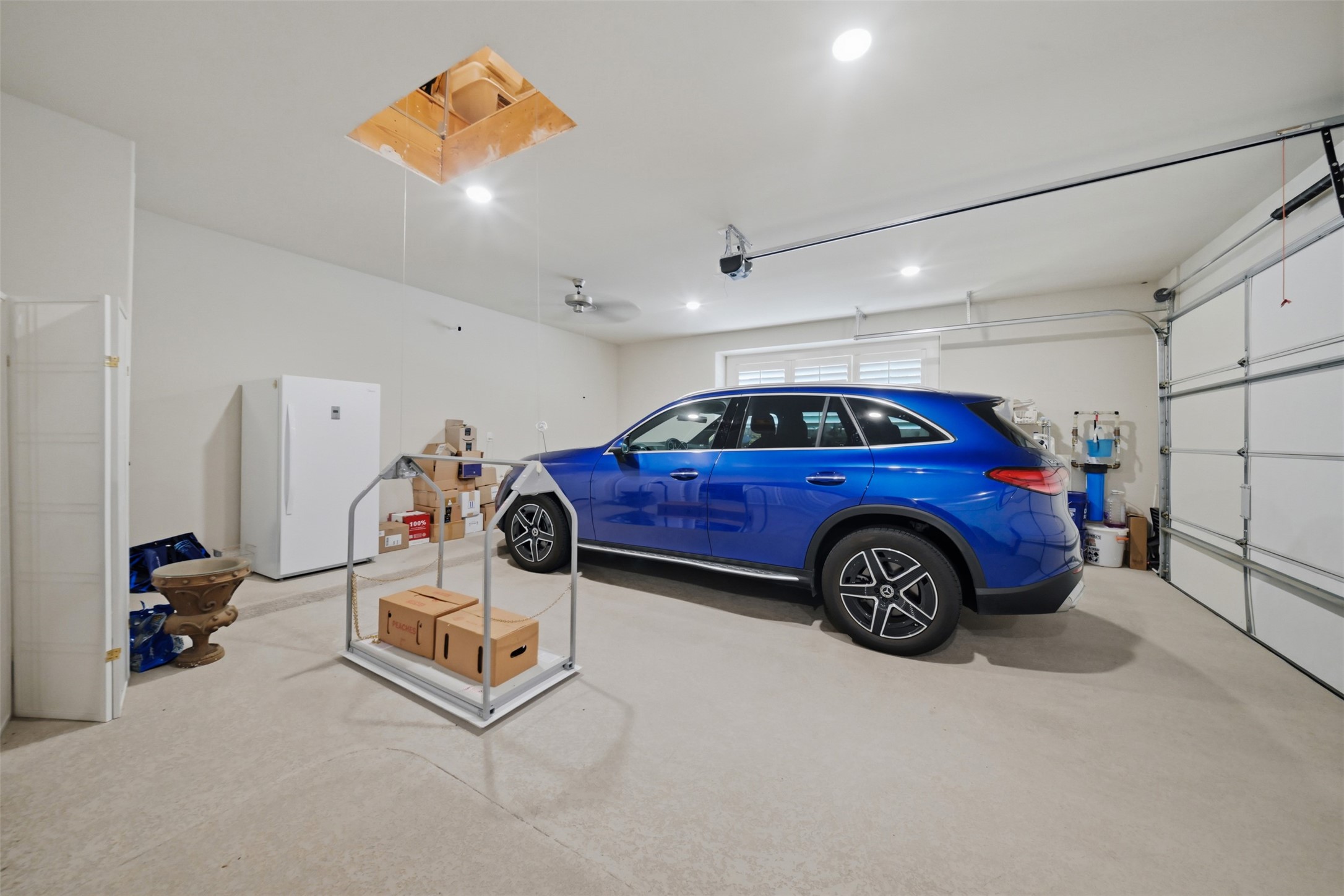 Versa Lift provides convenient access for moving items between the garage and attic storage.