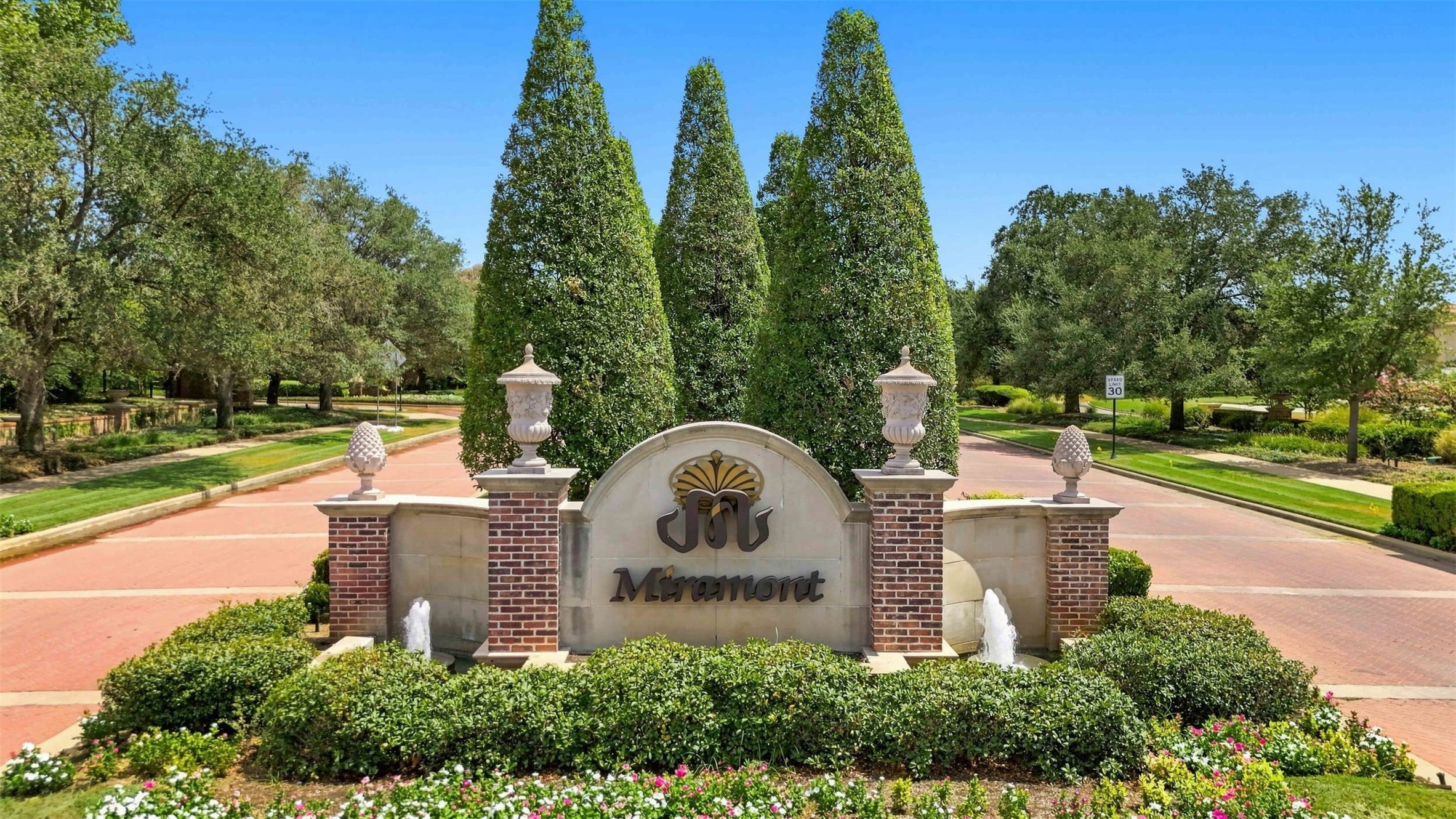 Beautifully landscaped entrance welcoming you to the prestigious Miramont community