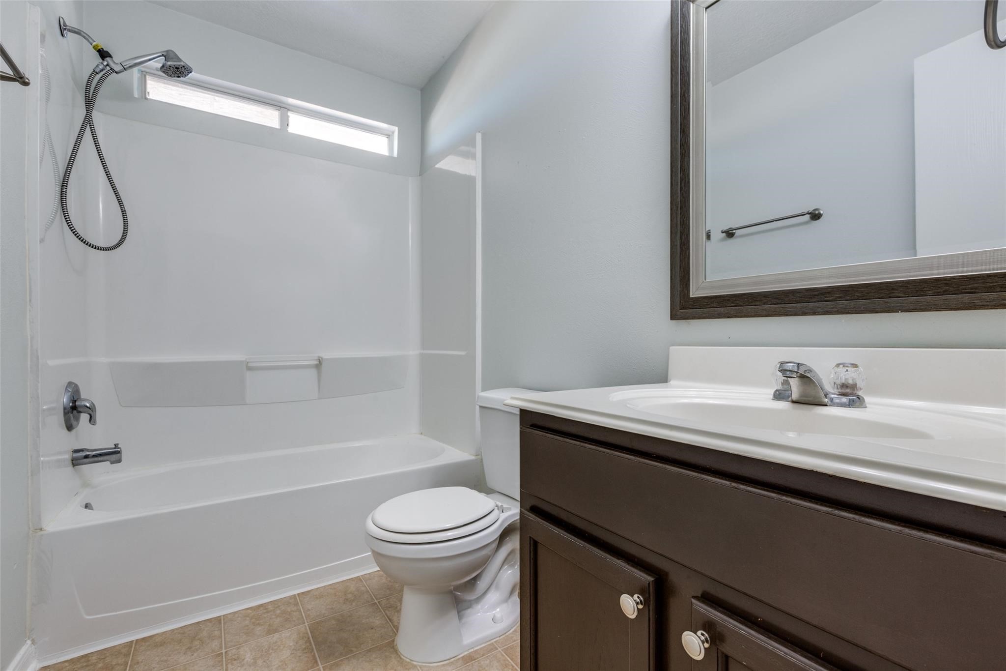Secondary Bath located between Bedroom 3 & 4