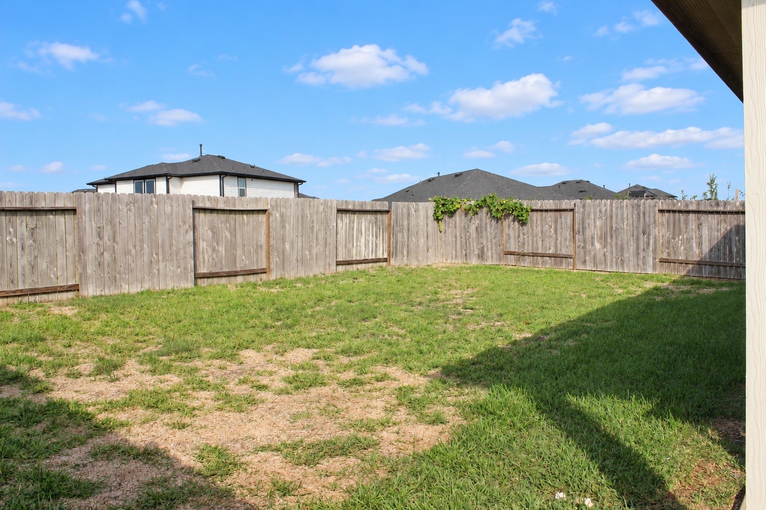 Spacious, Fully Fenced Backyard with Plenty of Room for Outdoor Entertaining and Relaxation