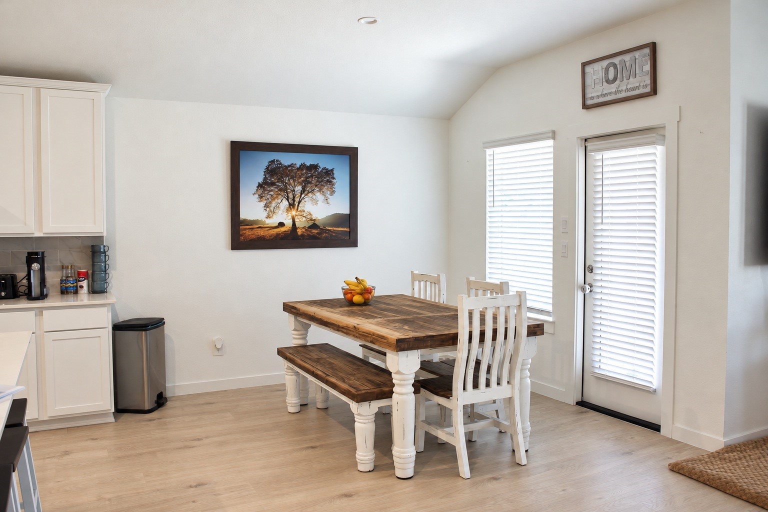 Dining Area with Natural Light, and Backyard Access.