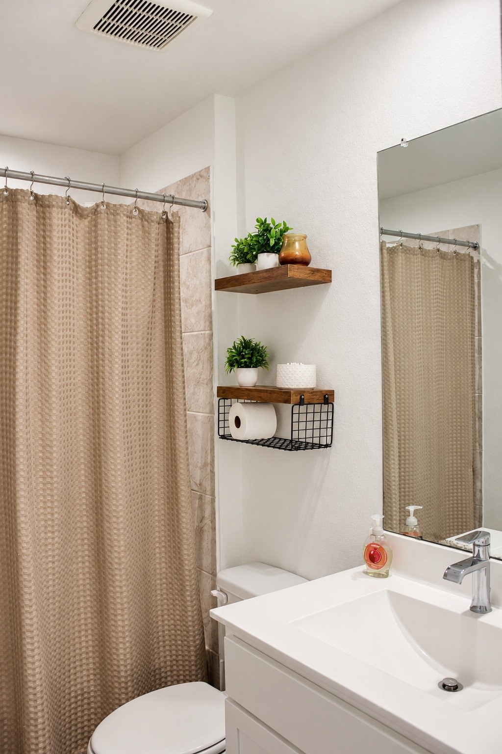 Guest Bathroom with Tub/Shower Combination and Modern Vanity.