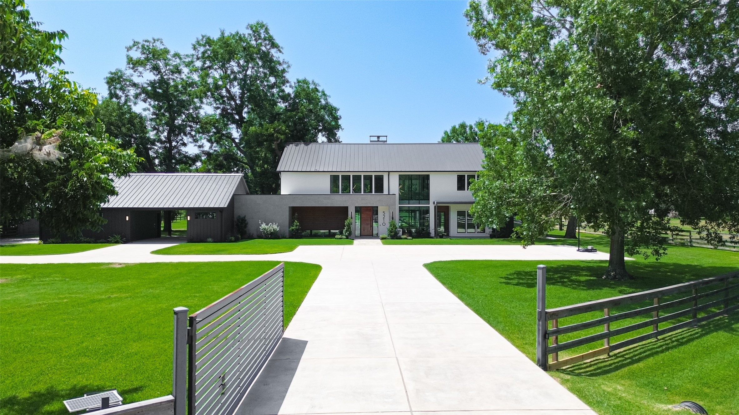A rare opportunity to experience modern estate living in the heart of Sugar Land. Beyond the gated entrance, a sweeping driveway welcomes you to an extraordinary private retreat surrounded by mature trees and expansive grounds.