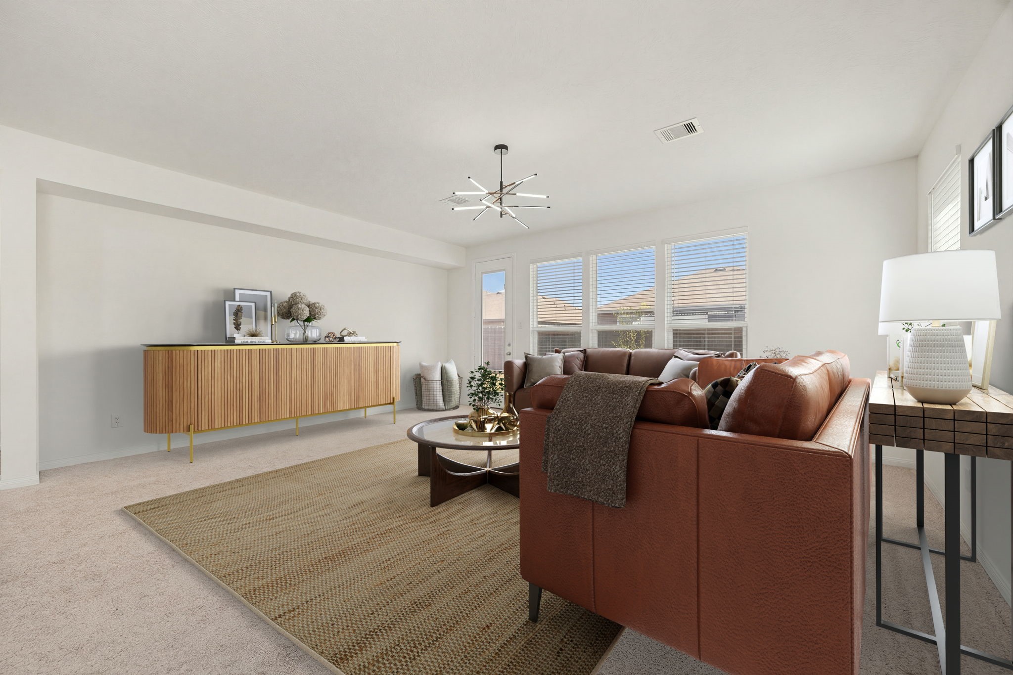The spacious family room features an expansive, deep-set custom media niche that effortlessly acts as the main focal point of the living zone. This unique architectural detail perfectly frames large-scale entertainment centers or a massive wall-mounted smart TV layout while maximizing floor space and keeping walkways clear. *Virtually Staged
