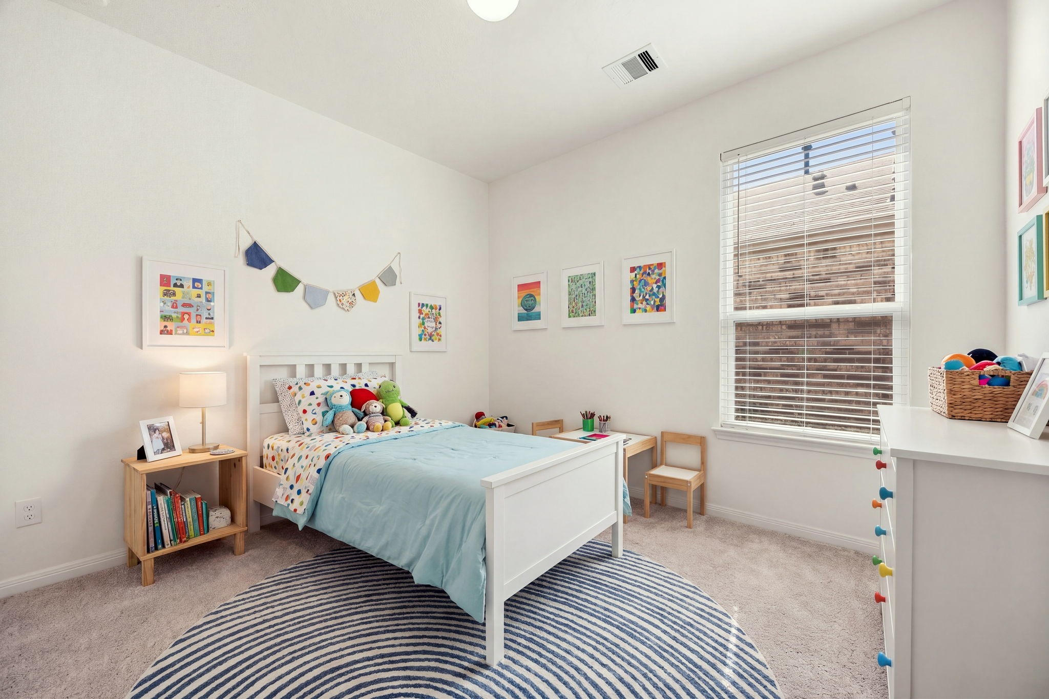 Another versatile secondary bedroom featuring plush neutral carpeting, soaring high ceilings, and soft white walls. A large window overlooks the side yard, keeping the room bright and cheerful while providing plenty of space for a growing family, guests, or a home hobby room. *Virtually Staged