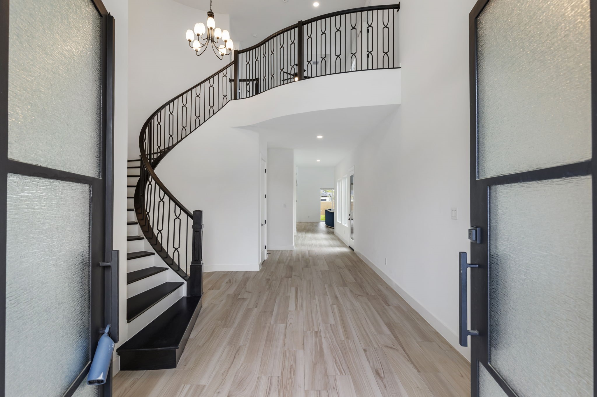 Grand Entry with curved staircase. Grand Entry with curved staircase.