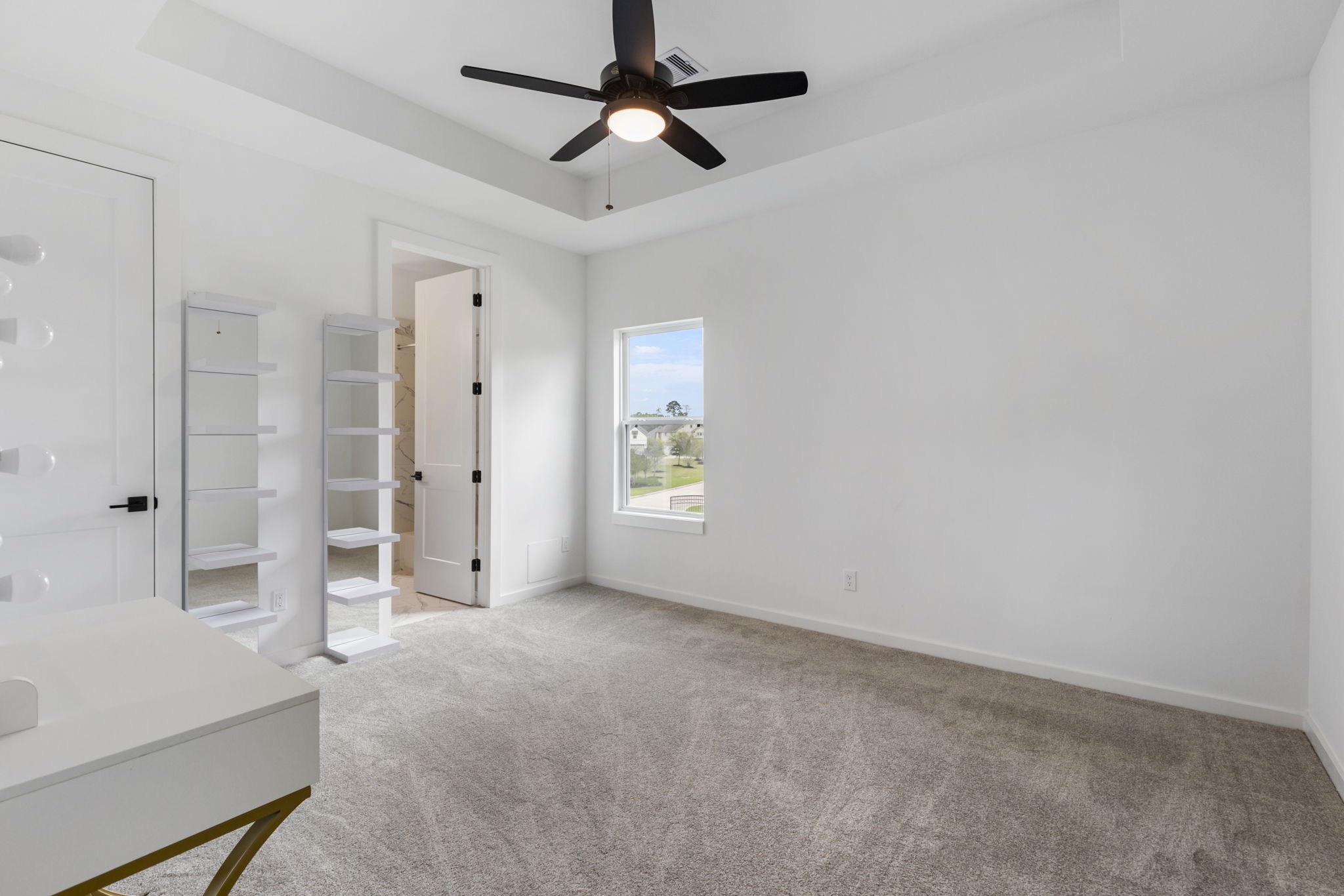 Secondary bedroom with ensuite on second floor.