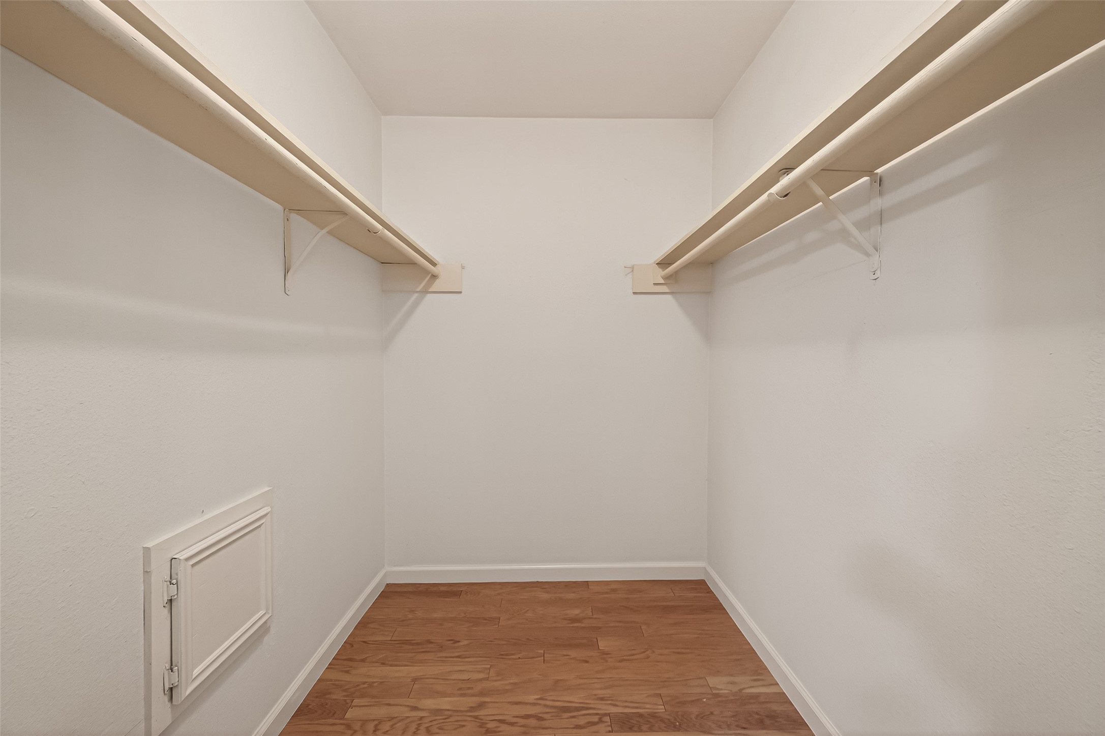 Huge walk-in closet (Primary Bedroom).