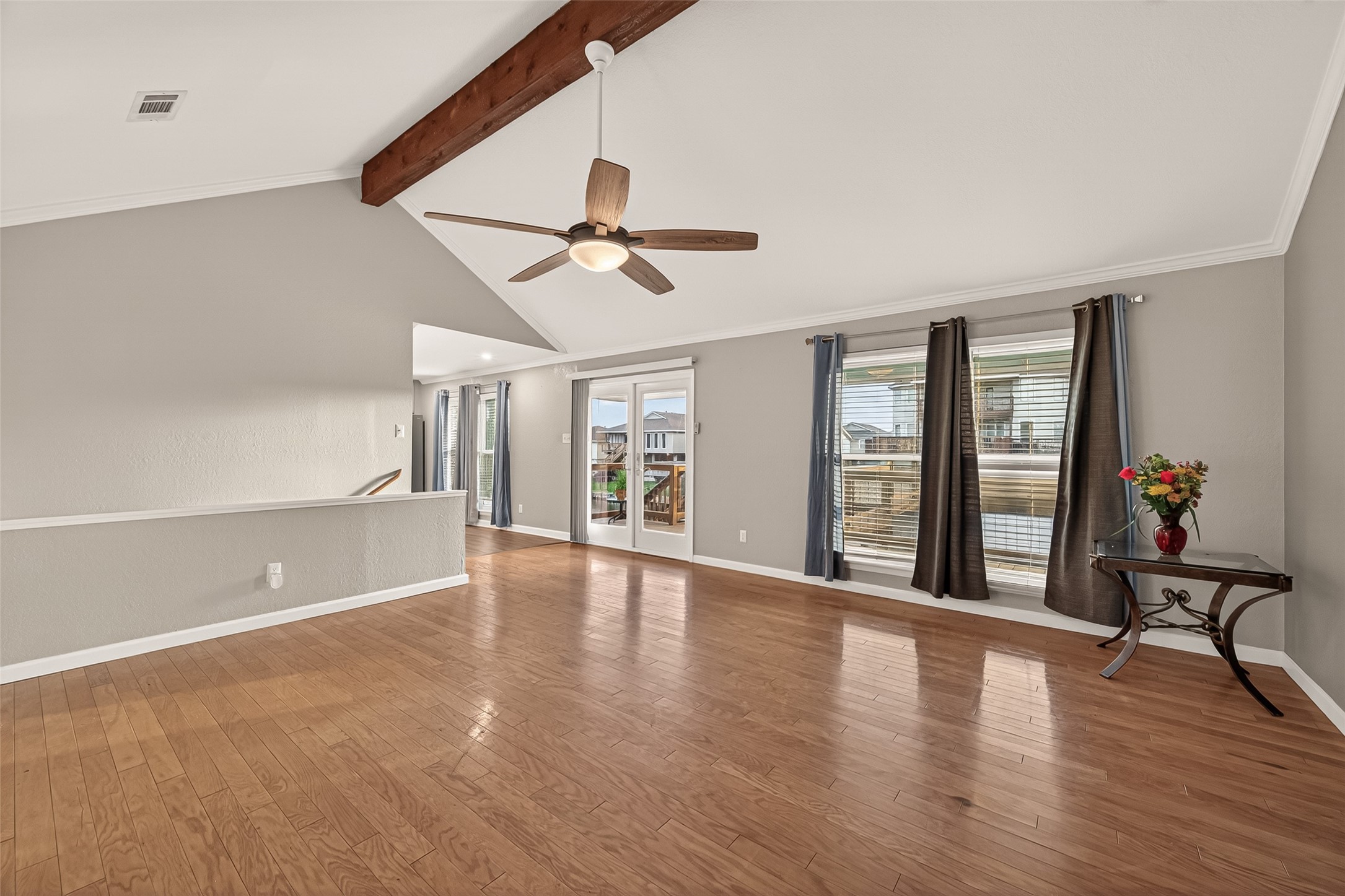 Family room with a vaulted ceiling.