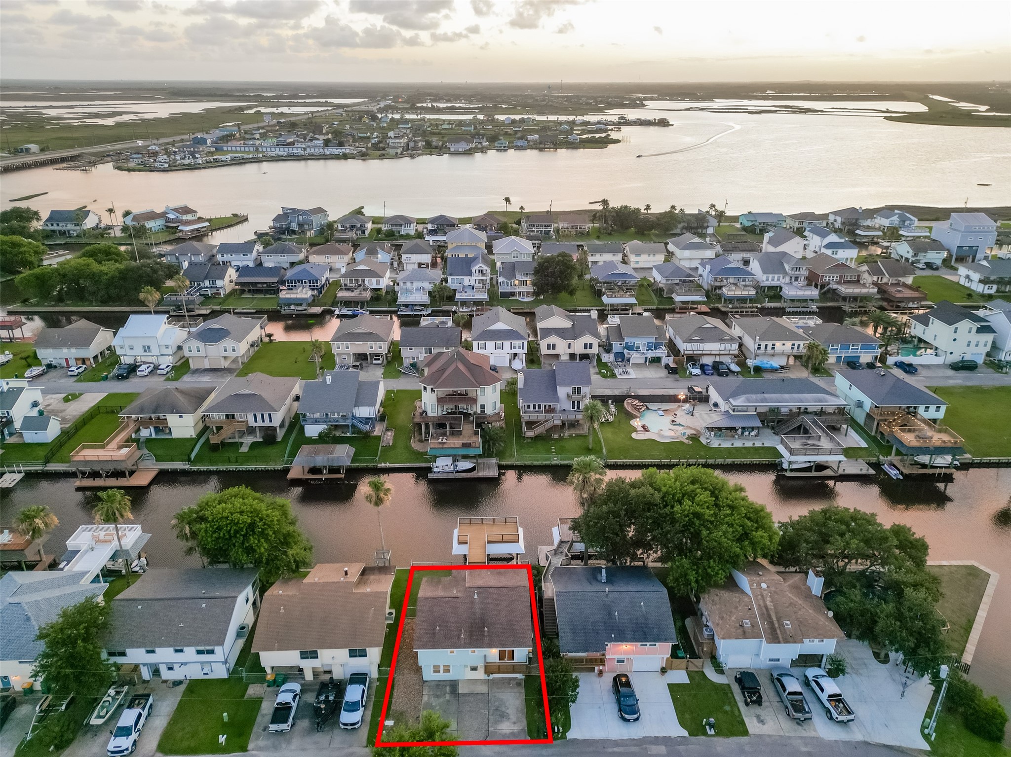 Picturesque view of 4 N. Sandpiper, its waterfront canal and nearby bay.  All waiting for you!