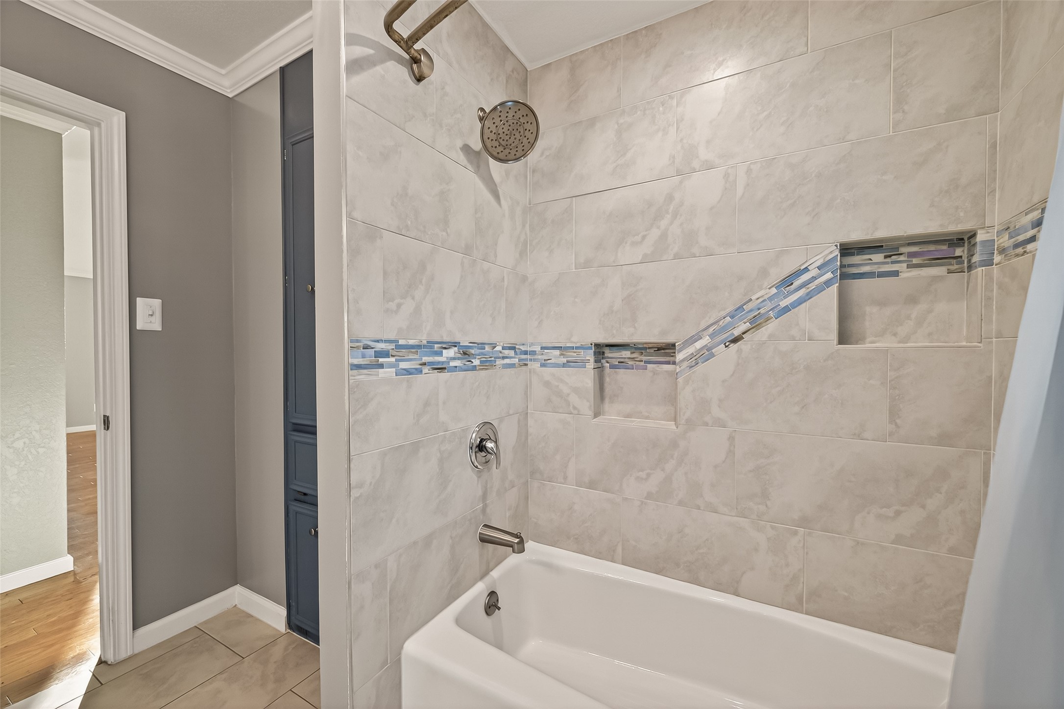 Guest bathroom upstairs shower/tub combination.