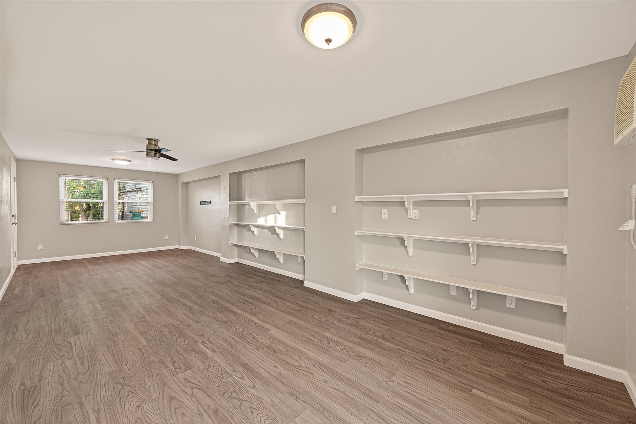 Multi-functional room downstairs.  Can easily be a 3rd Bedroom, game room or an in-law suite.  Downstairs is grandfathered for insurance purposes.