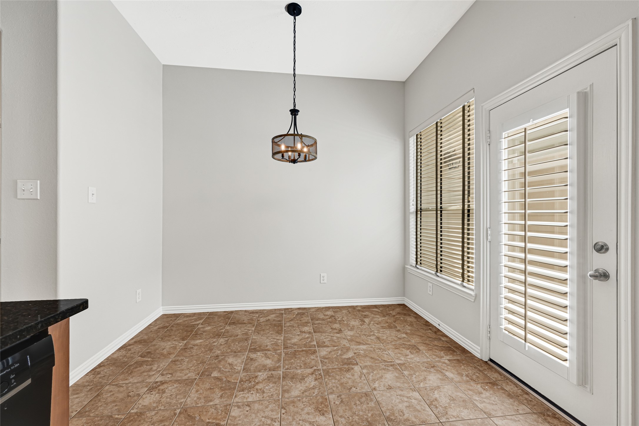 Breakfast room with door leading to patio. Perfect for grilling.