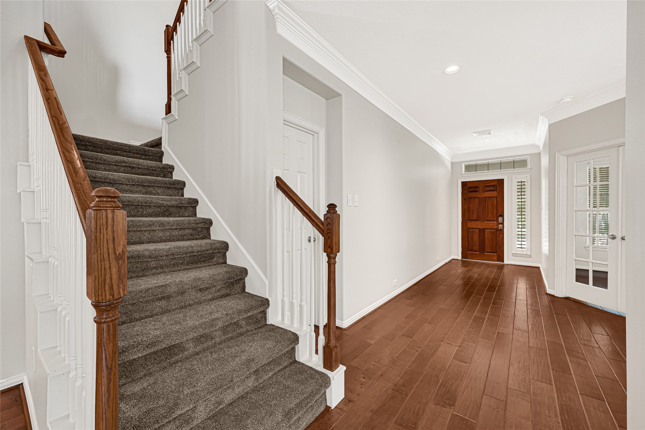 Fresh interior paint throughout with crown molding adding elegant detail.