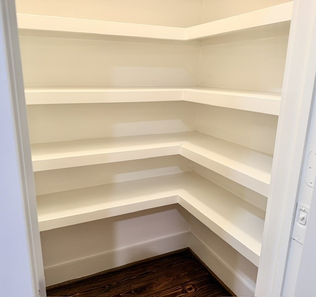This fantastic walk-in pantry has plenty of space for everything you need