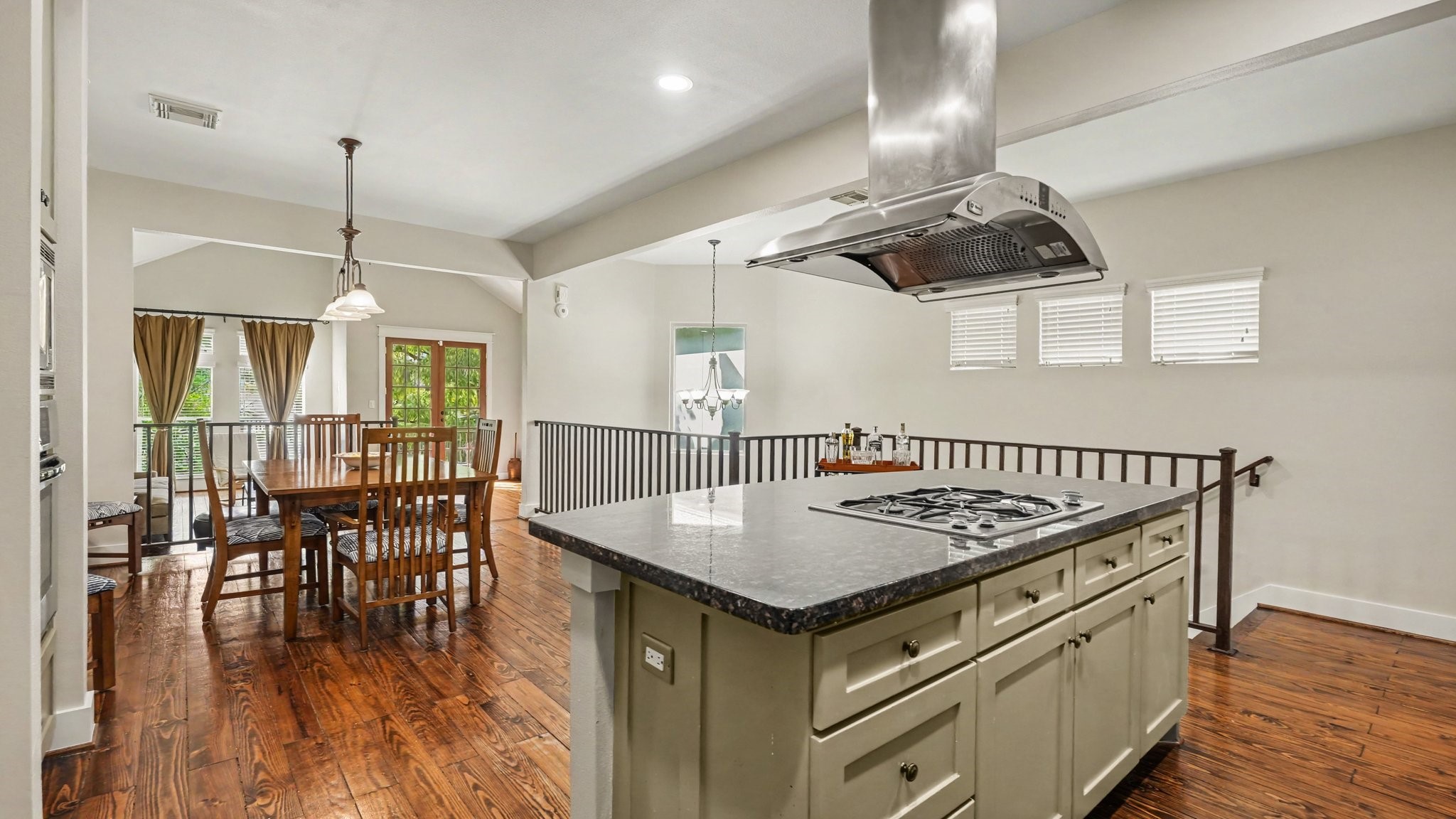 This view shows again how seamlessly the kitchen and dining room flow together, with the living room just beyond this floor plan is so inviting and open.