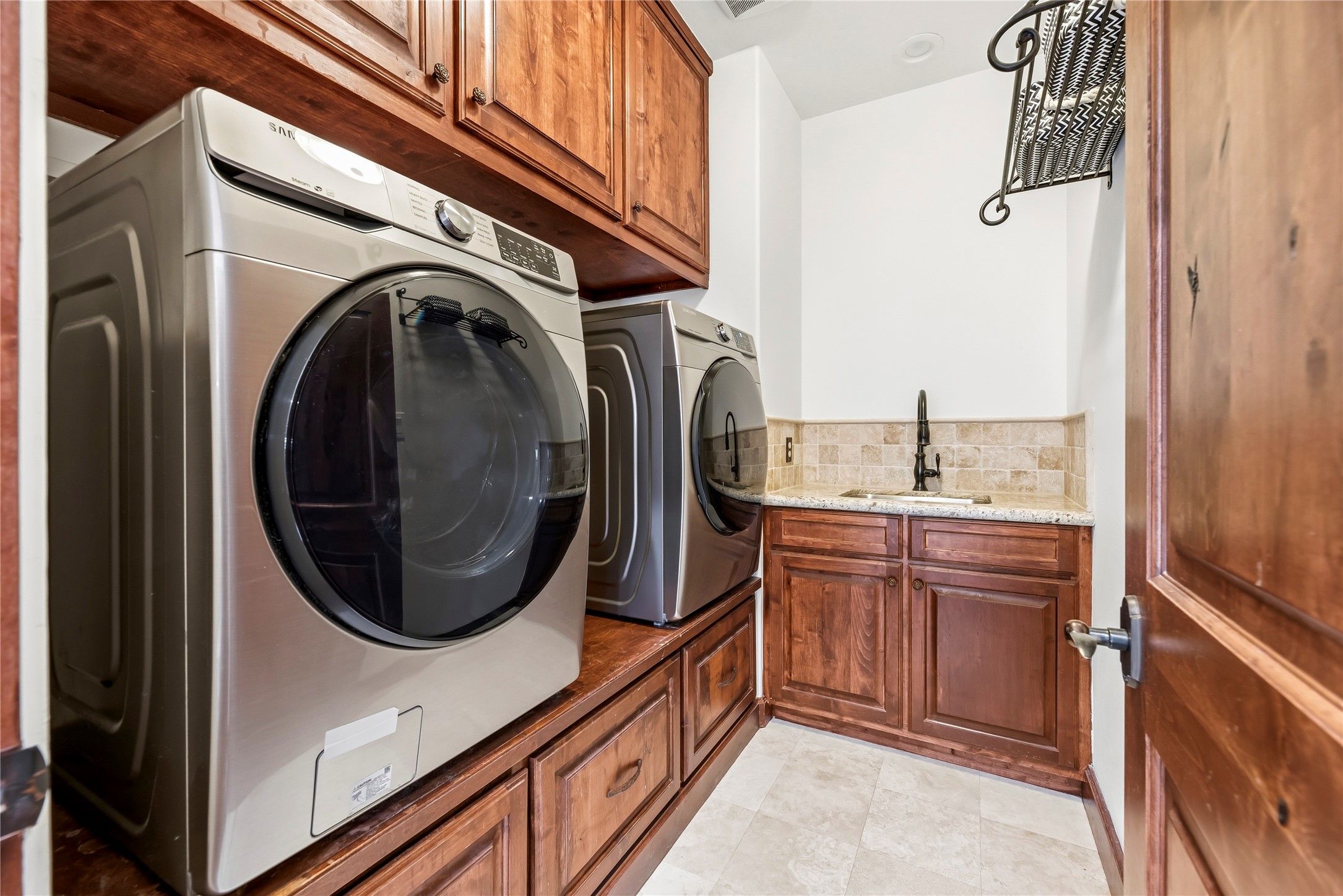 Experience convenience with the in-house utility room, thoughtfully designed with a dedicated laundry area.