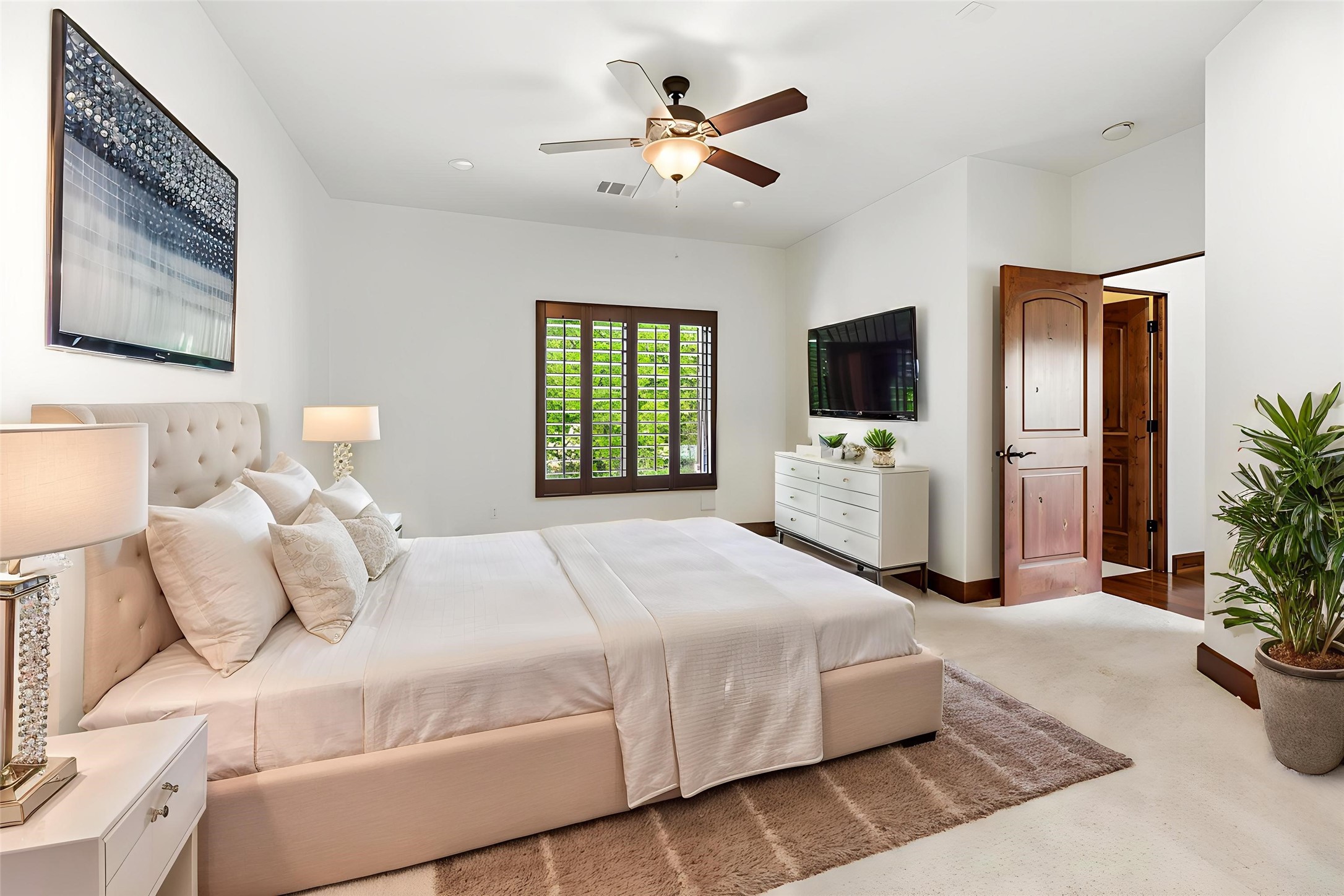 Each bedroom is well-appointed with quality finishes and custom window treatments, maintaining the high-end feel found throughout the entire home. Virtually staged.