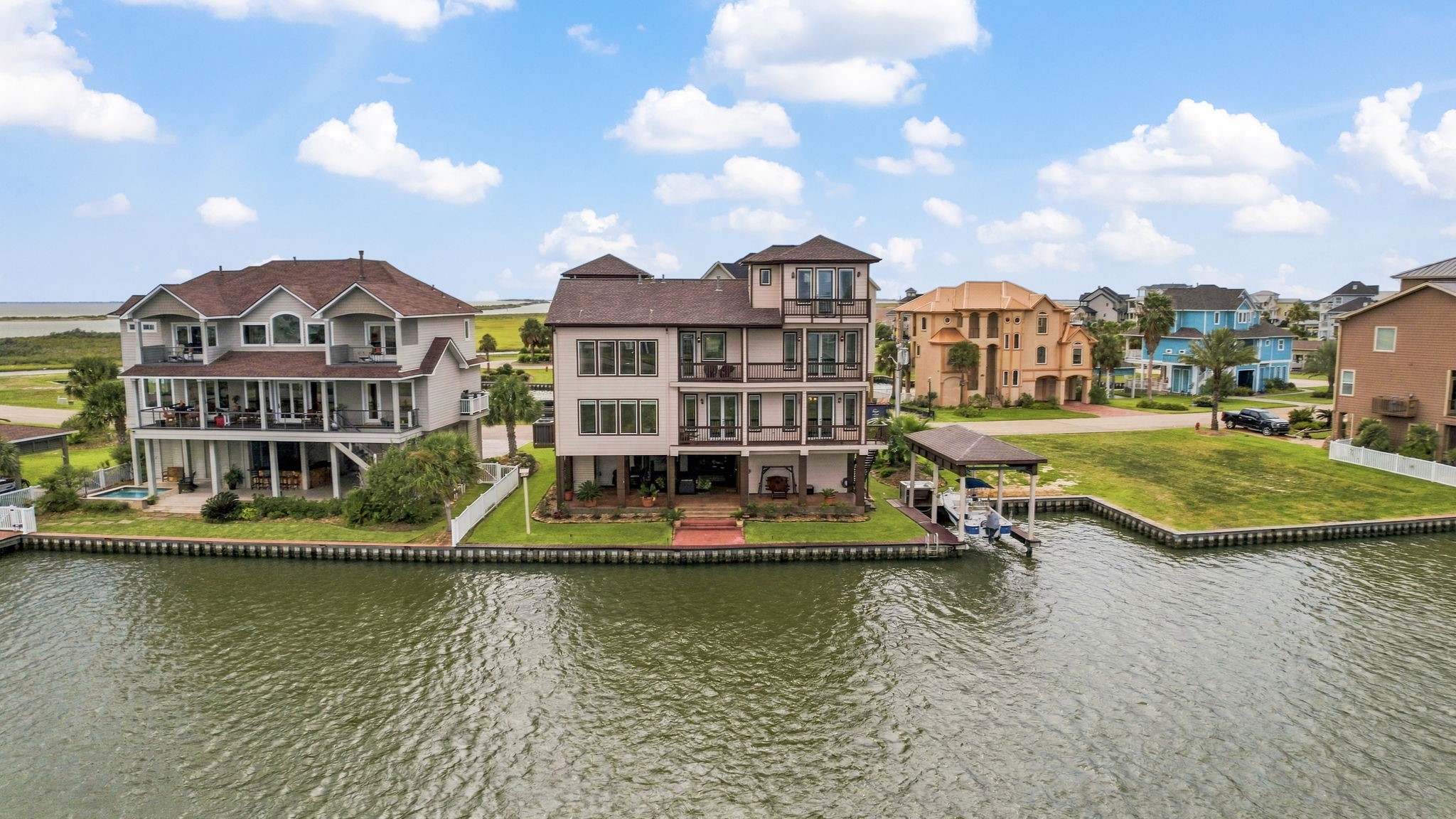 Stunning waterfront homes with private docks, offering serene canal views and spacious outdoor living areas, perfect for enjoying tranquil waterside living. Stunning waterfront homes with private docks, offering serene canal views and spacious outdoor living areas, perfect for enjoying tranquil waterside living.