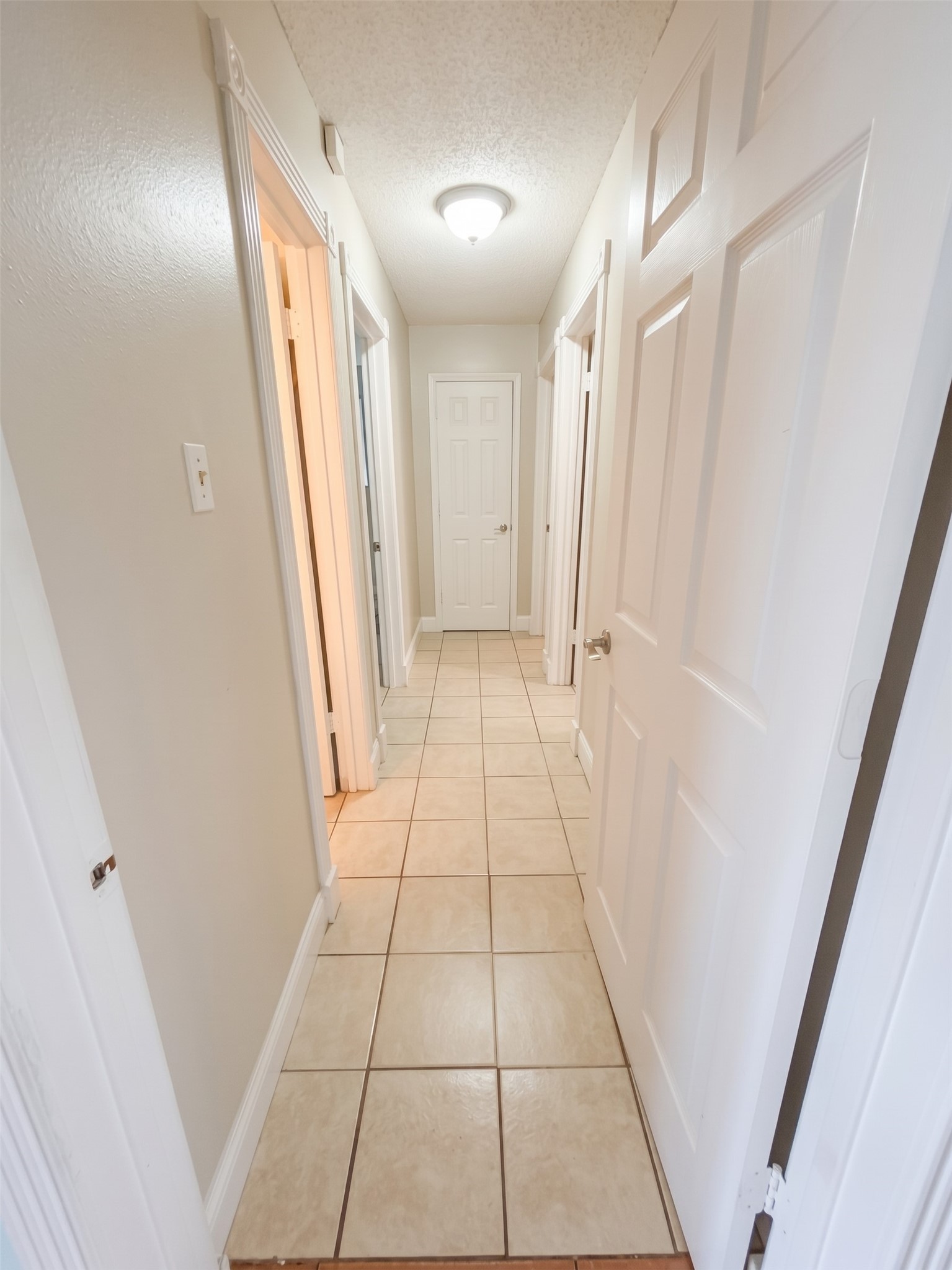 Hallway to Primary and Secondary Bedrooms