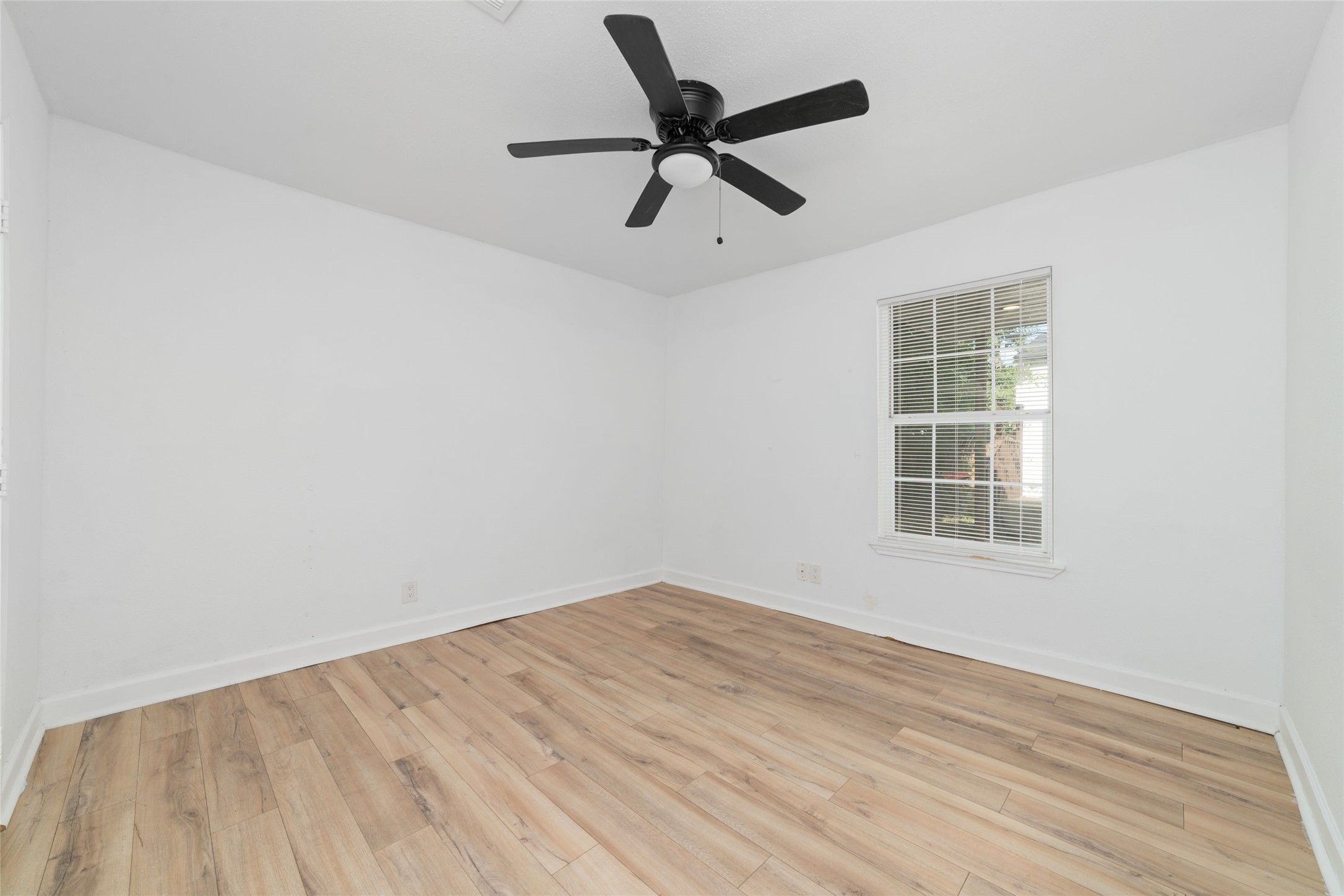 Second of four bedrooms in this home.