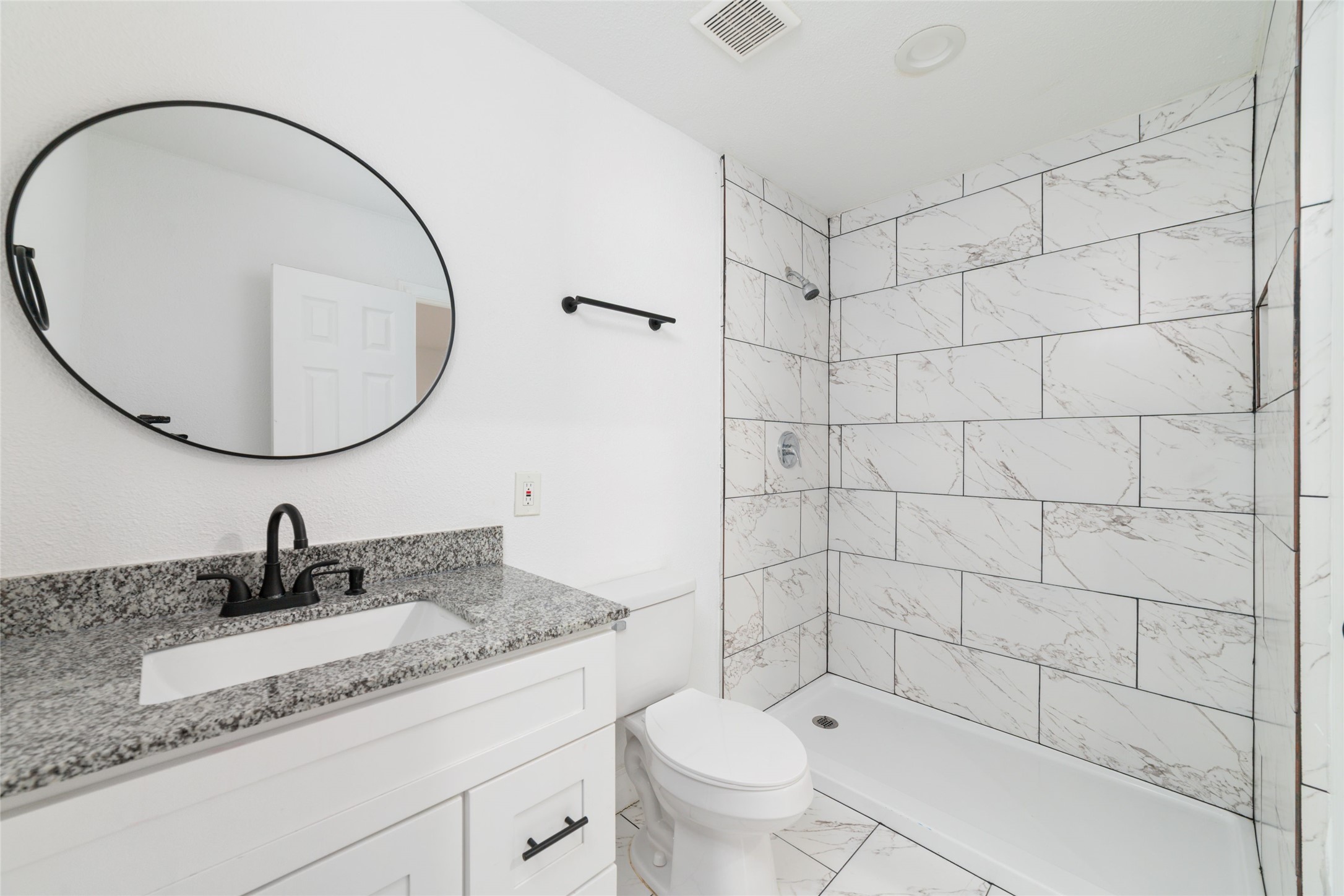 One of three bathrooms in this home.