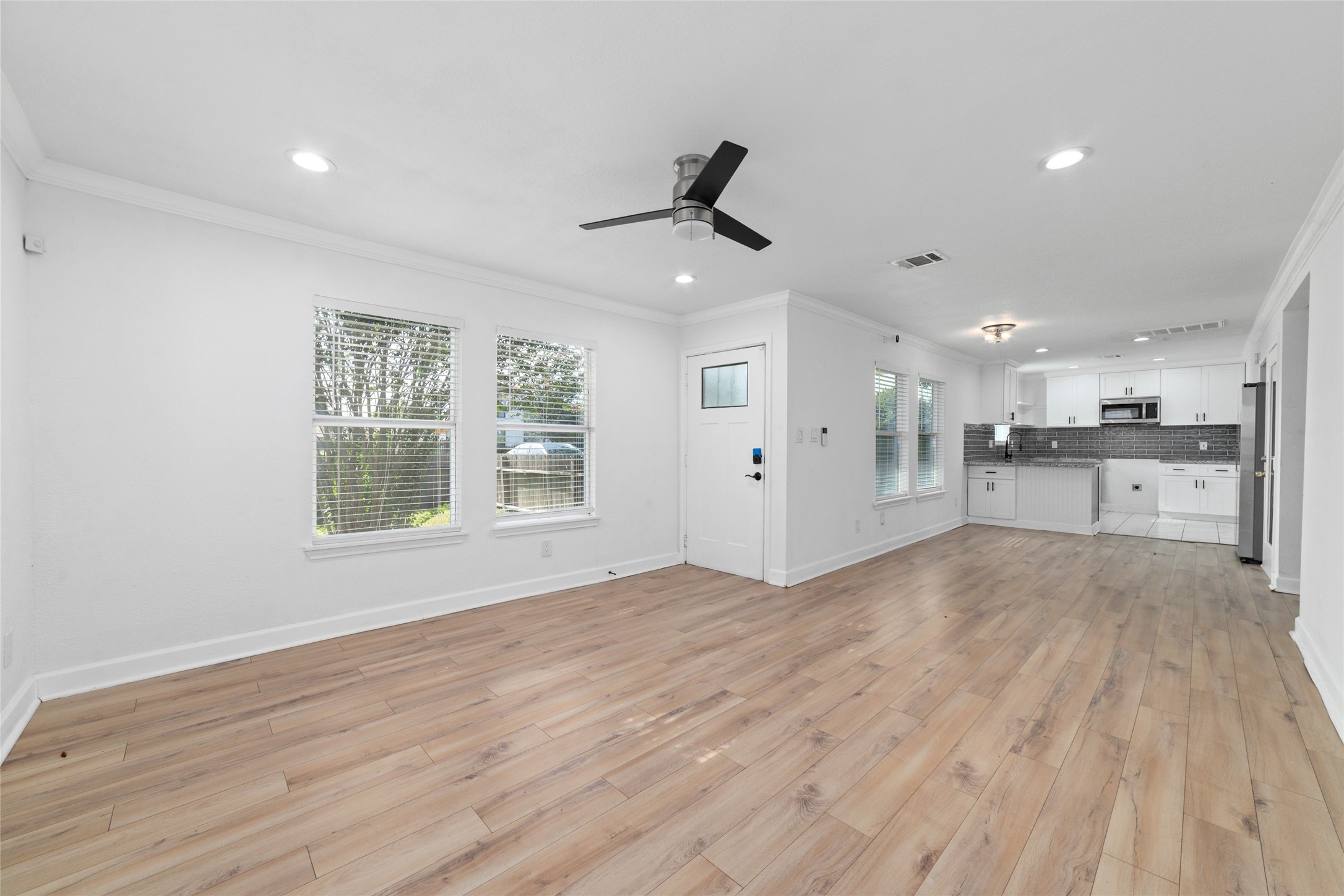 Welcome inside this adorable, well-loved home that is an open concept floor plan. Just inside this front door, your family too that seamlessly flows into the dining space and your kitchen.