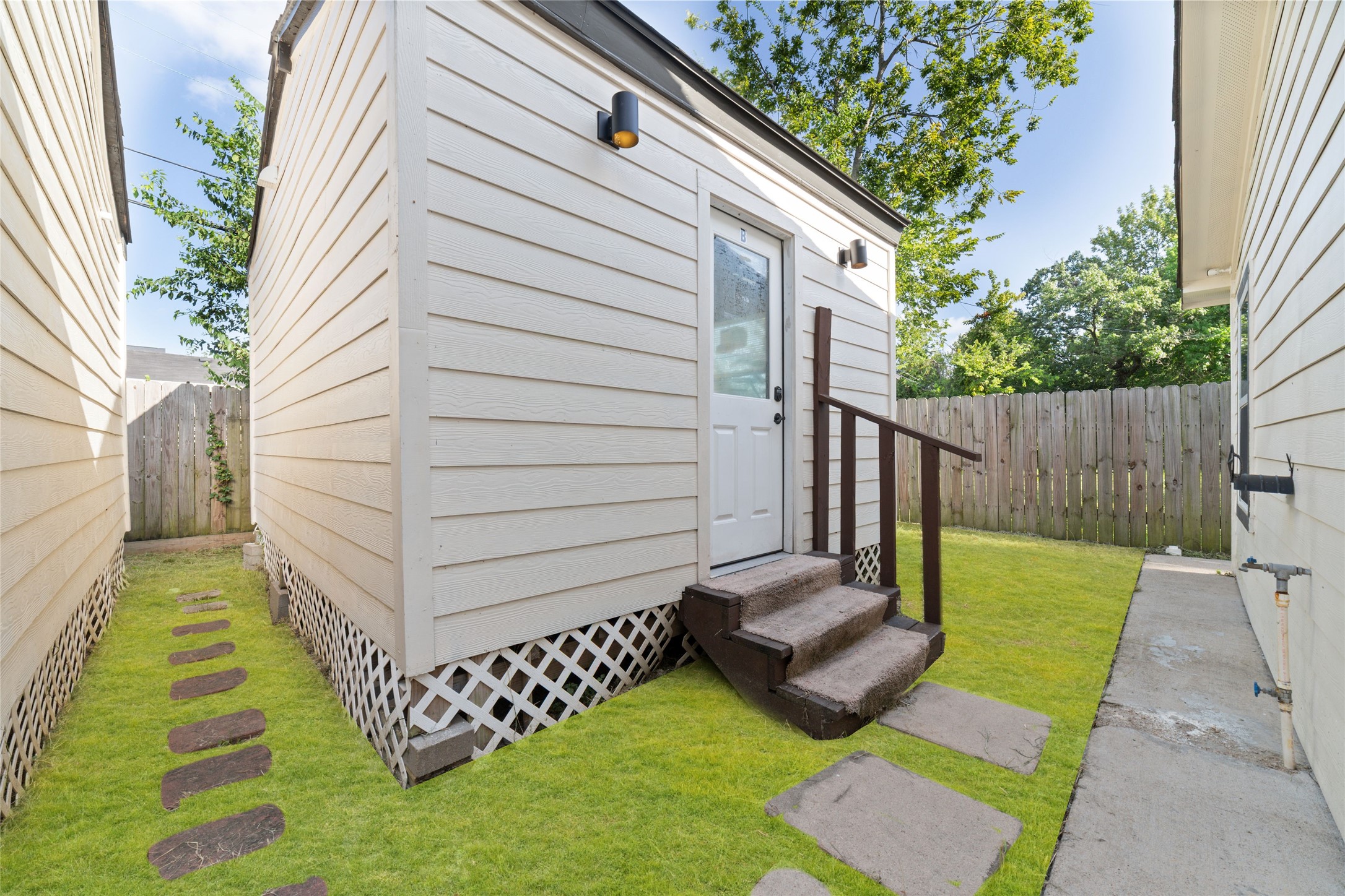 One of two small dwellings with its own HVAC that can be a home office, additional bedroom or gym.