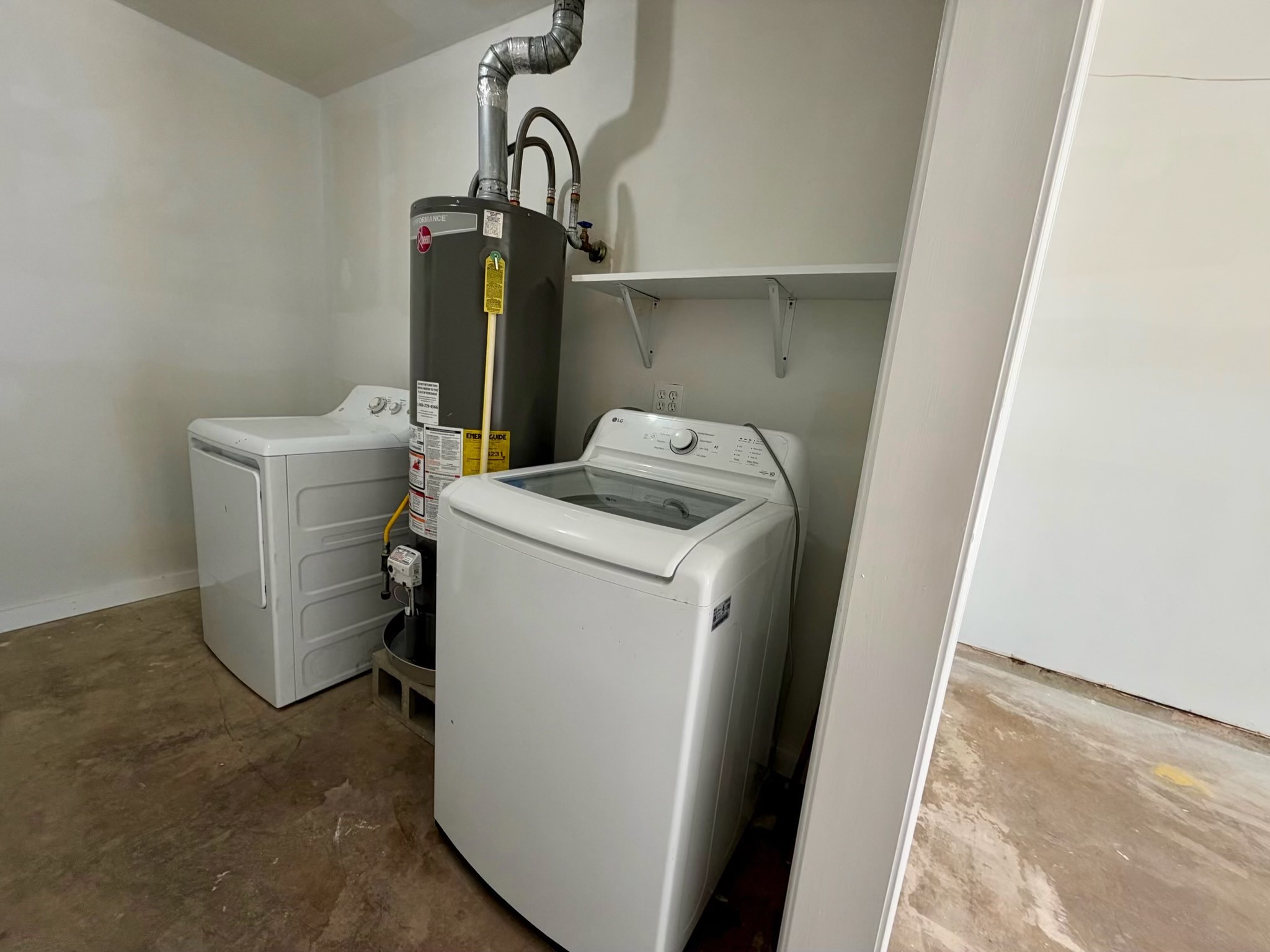 Utility Room in the garage. Washer & Dryer included