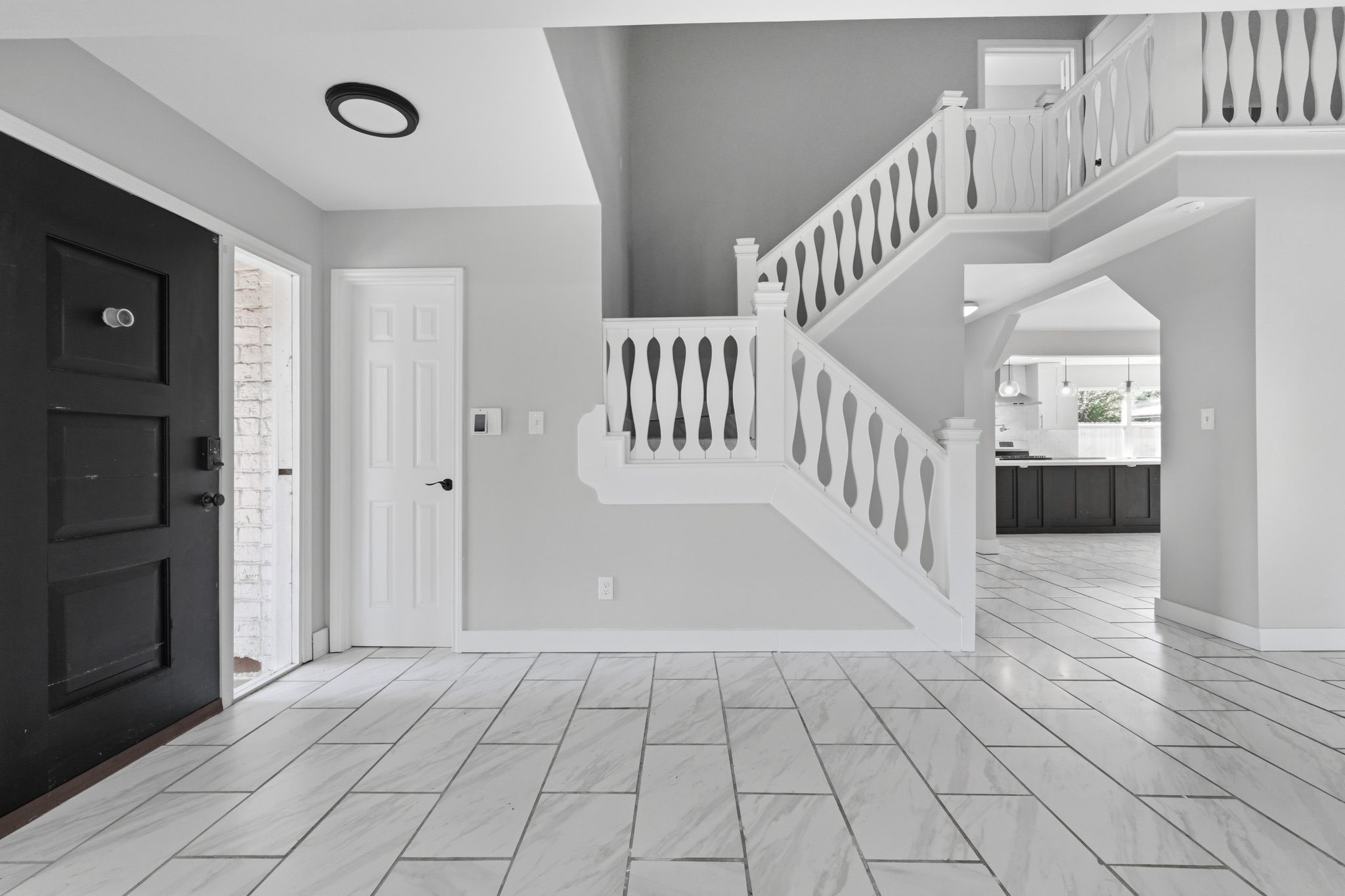 The stair case is conveniently located in the house for easy access between stories.